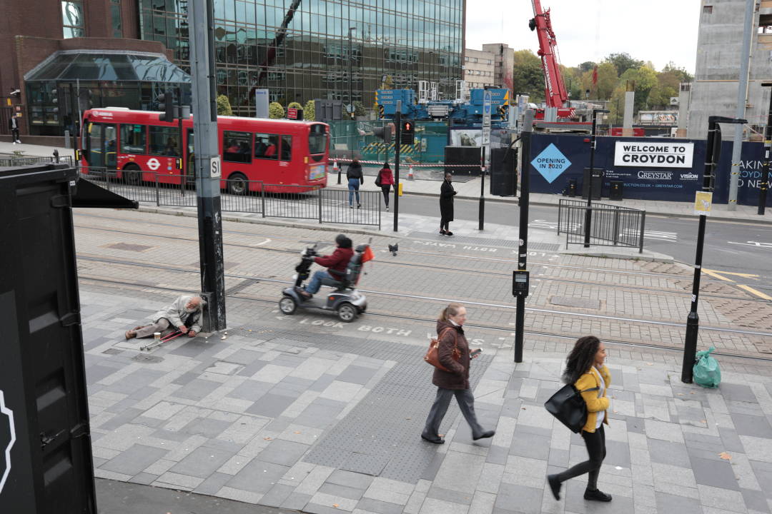 Photo of a street in Croydon with a building site on one side