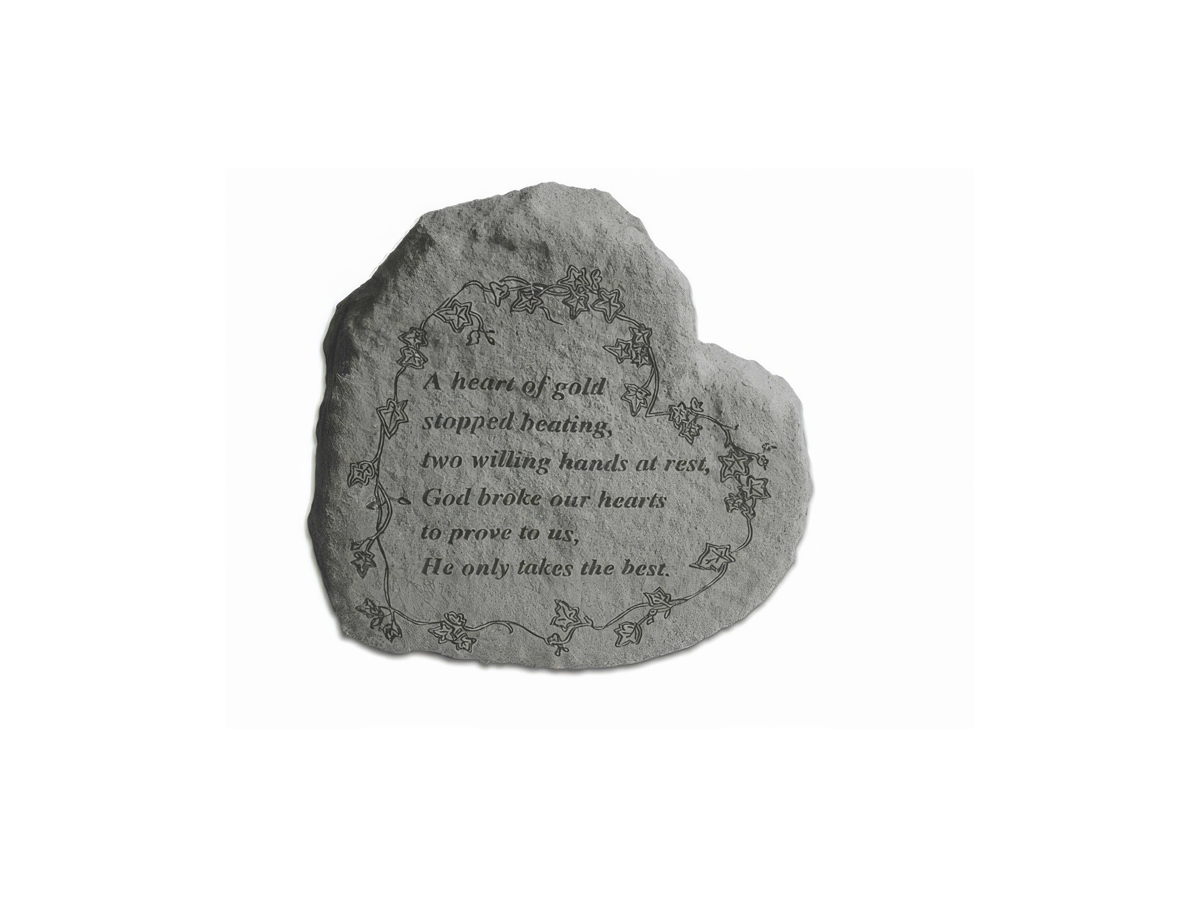 A carved stone in a heart shape features a heartfelt message about love, loss, and acceptance.