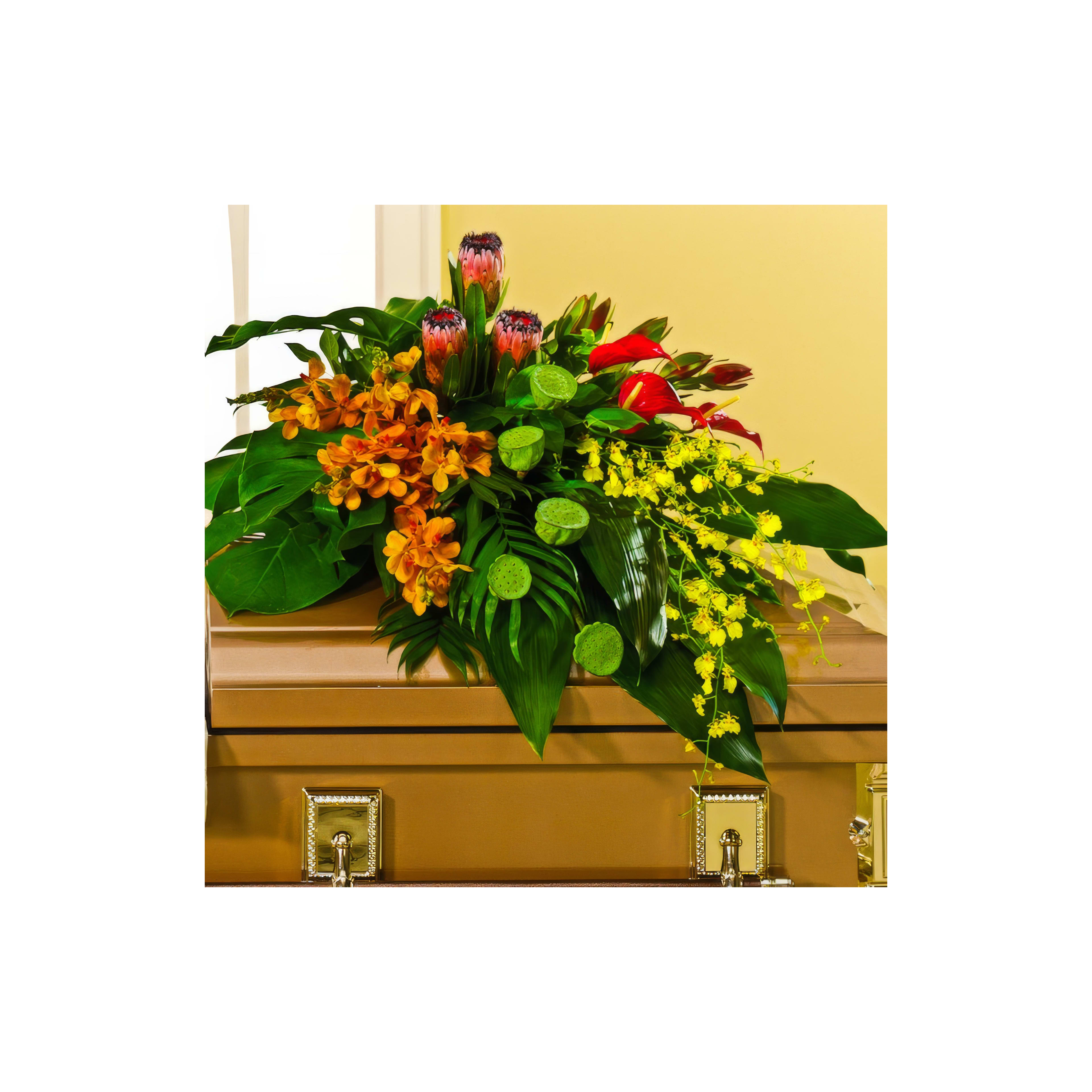 A vibrant flower display on the casket honors and remembers a lost loved one.