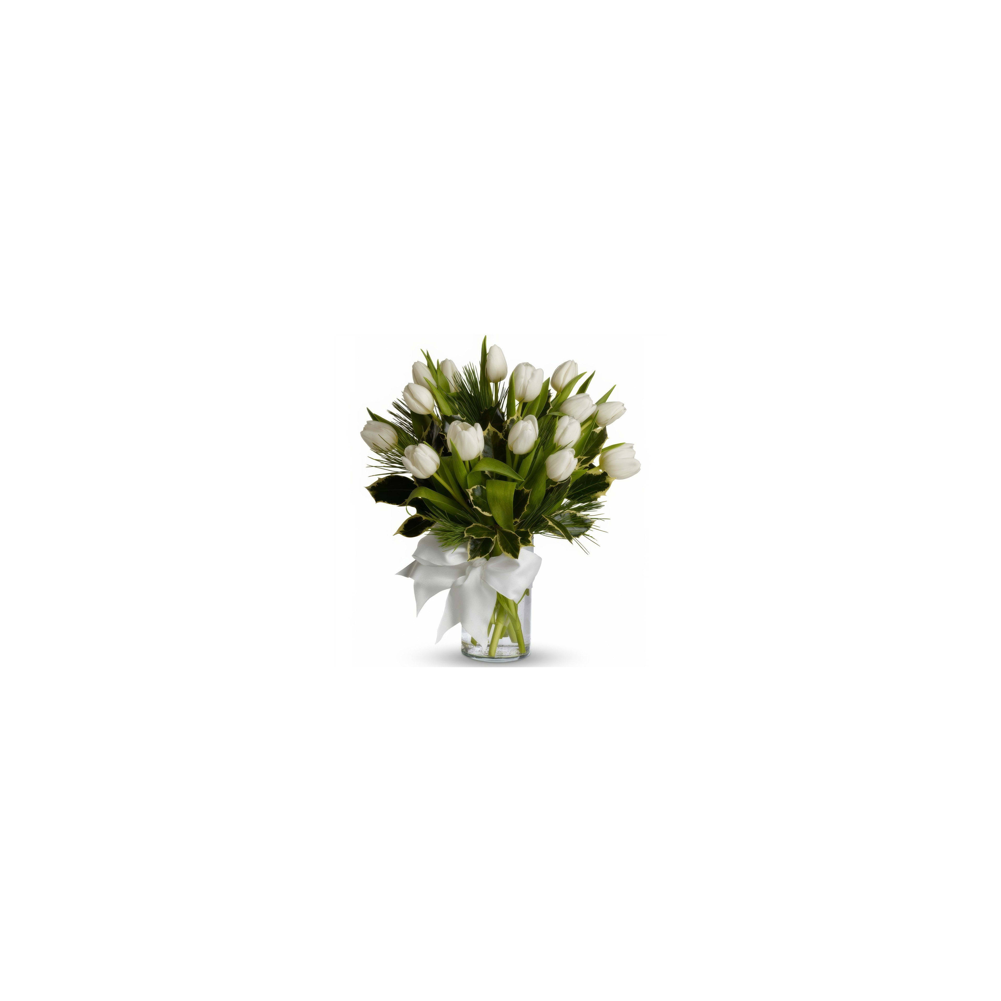 A beautiful bouquet of white tulips and greenery in a clear vase brightens the room.