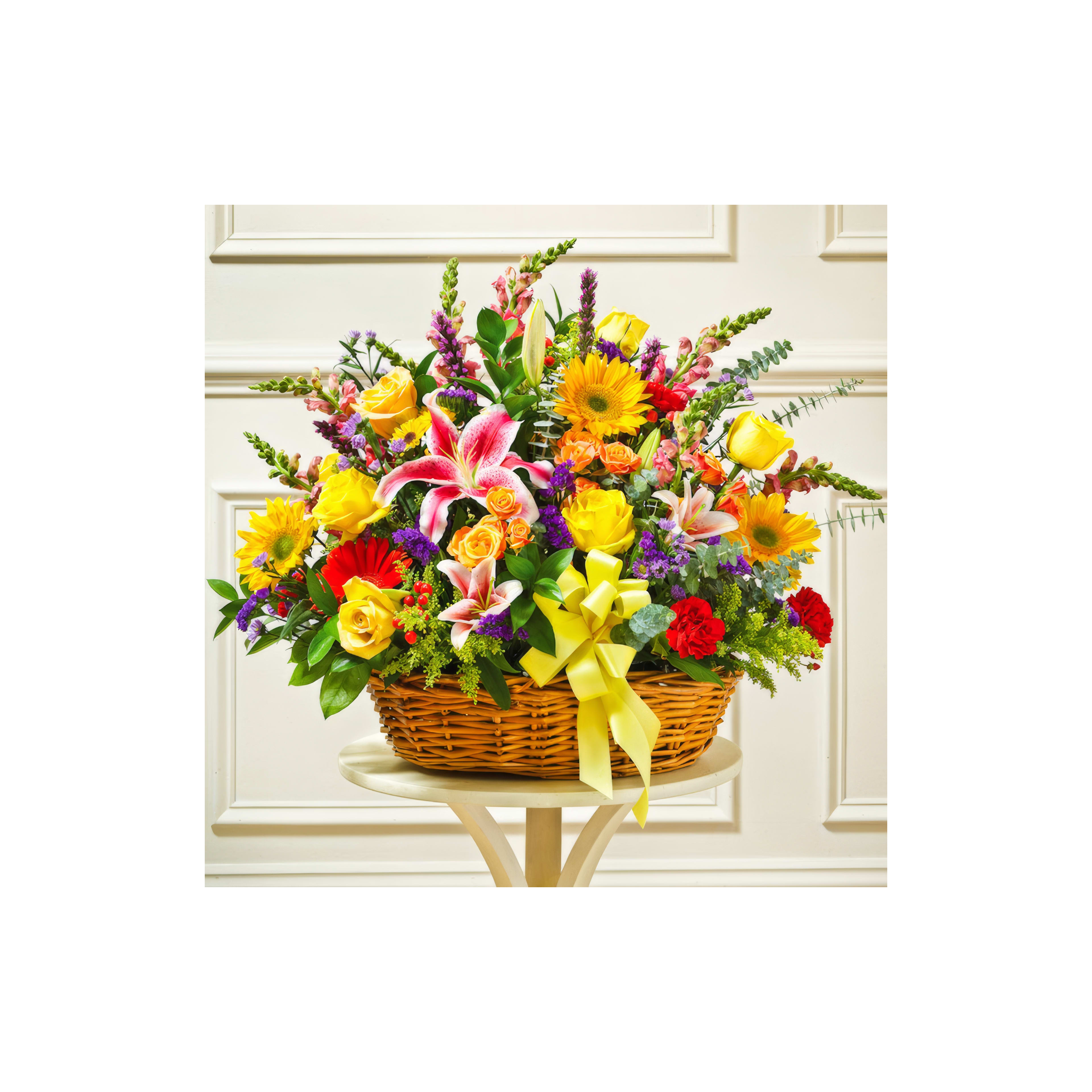 Brightly colored flowers in a wicker basket create a festive atmosphere indoors.
