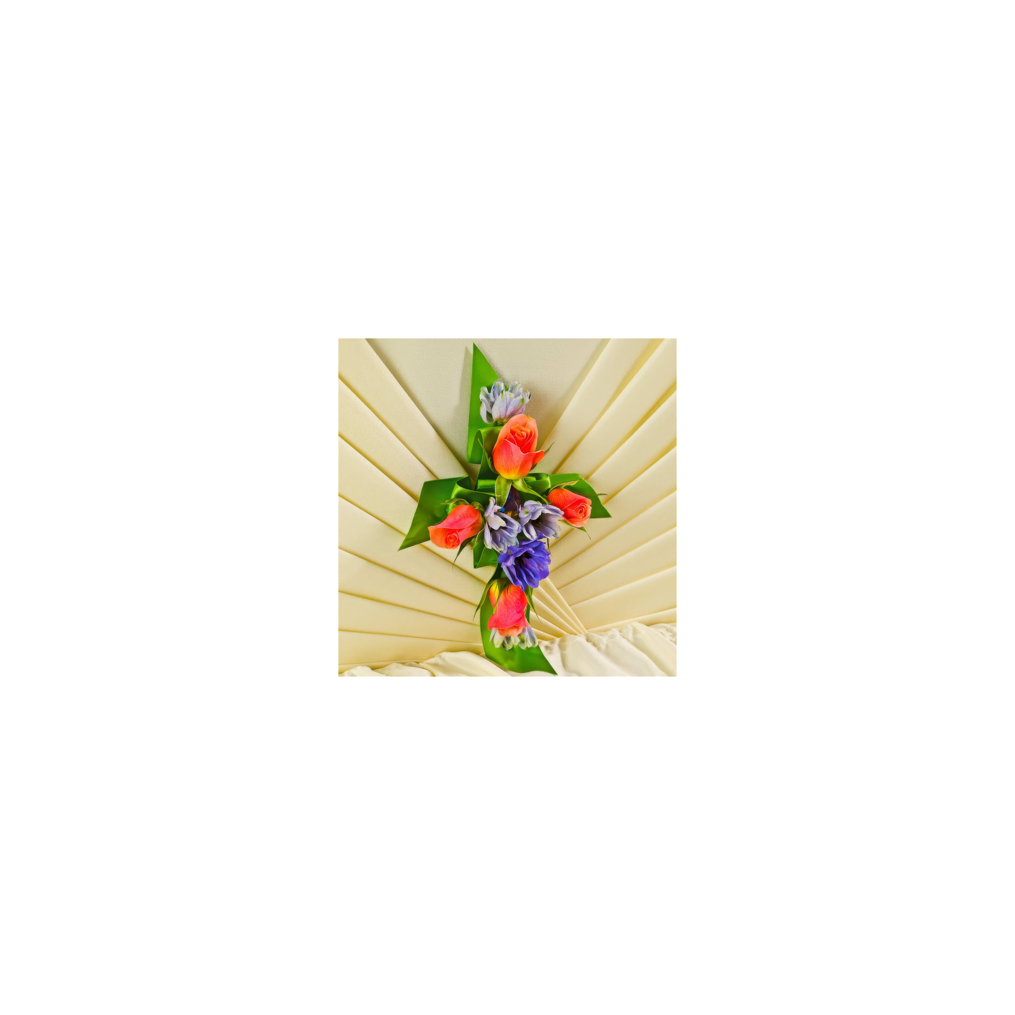Colorful flowers arranged in a cross shape, showcasing vibrant blooms against a soft background.