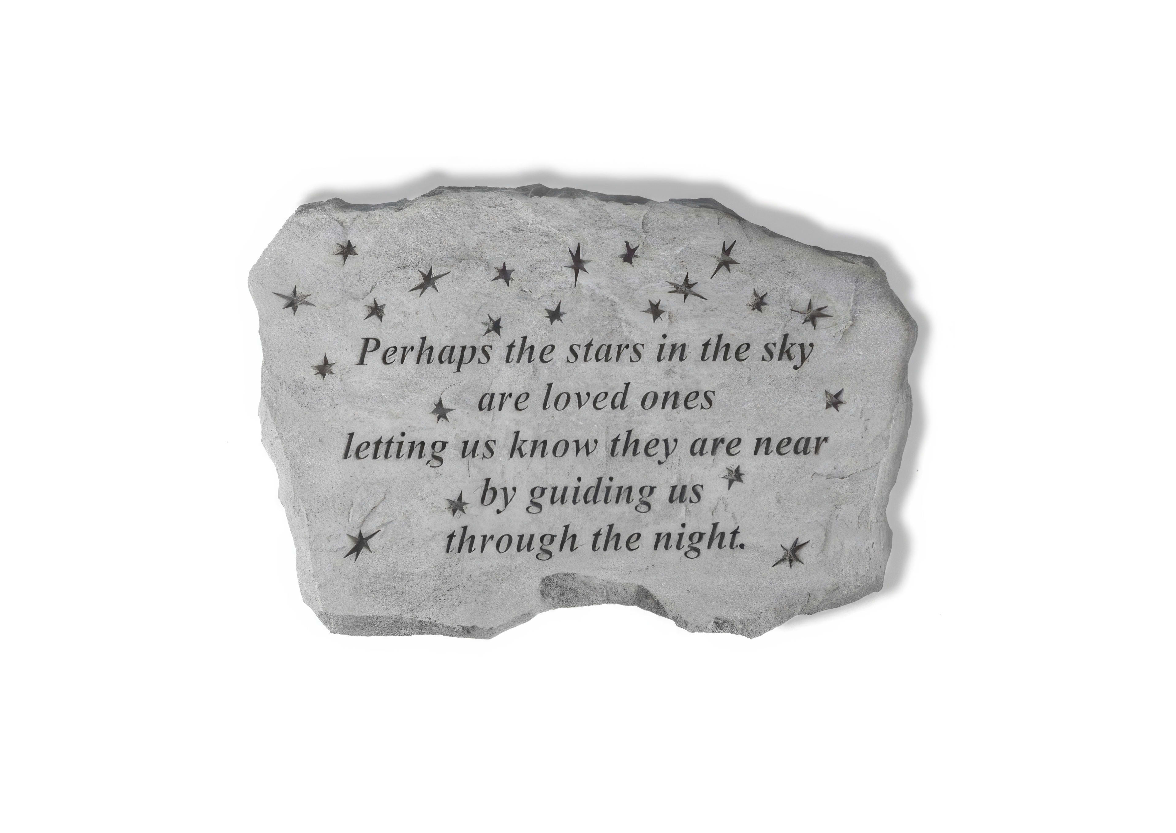 A stone bears an inscription on stars and guidance, offering reflection and comfort.