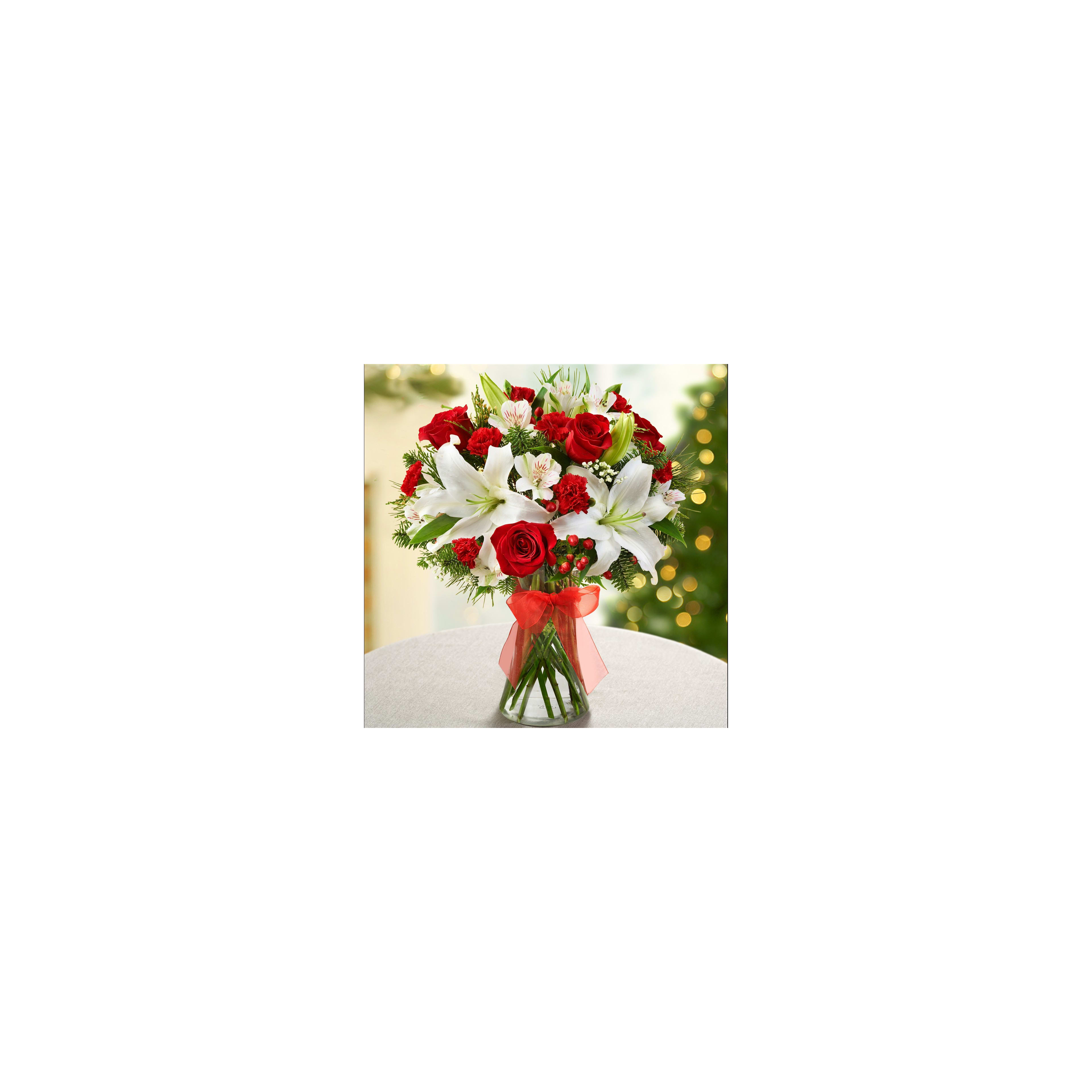 Bright red roses and white lilies make this bouquet ideal for holiday festivities and decor.
