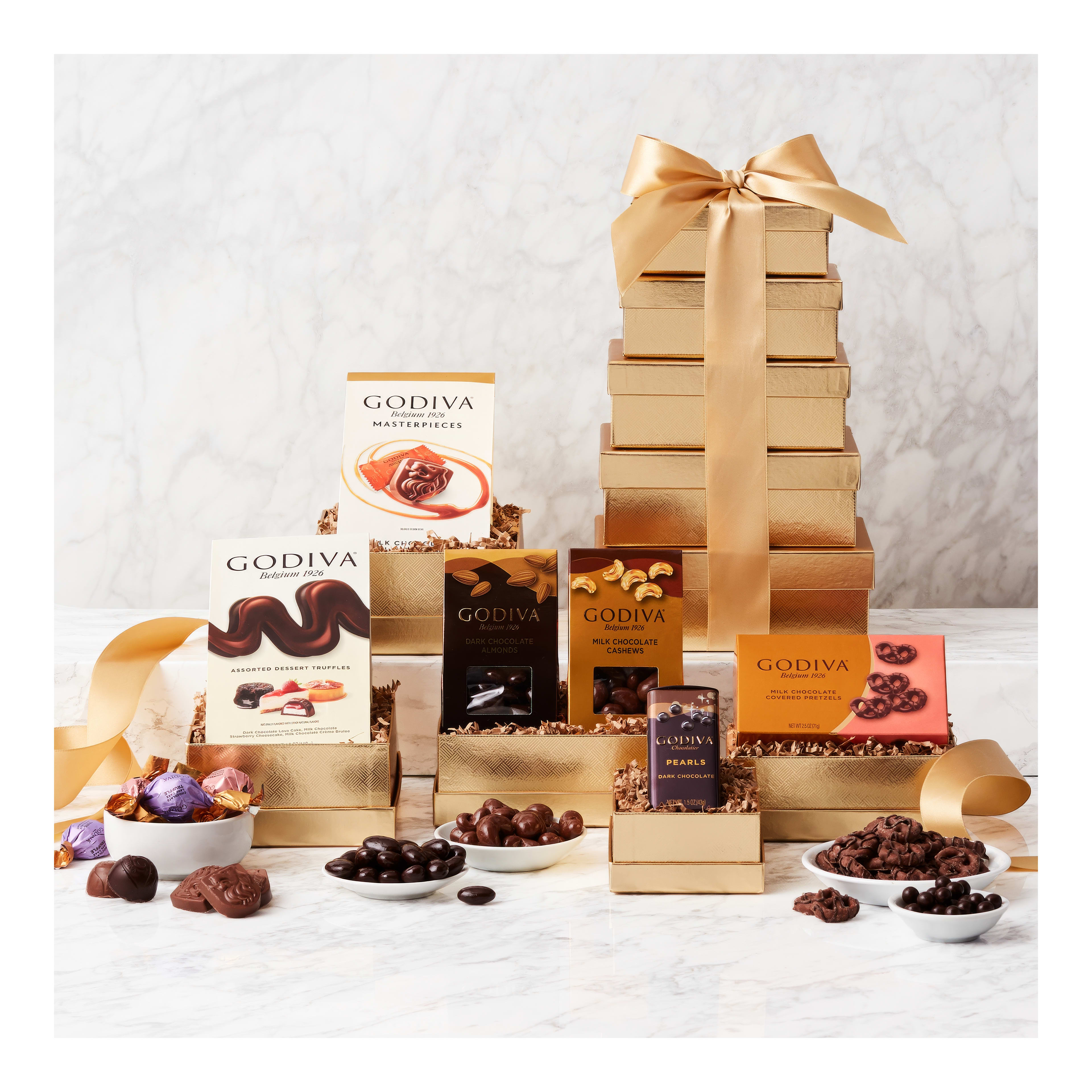 A lovely stack of chocolate boxes with pralines and truffles, ideal for gifts.