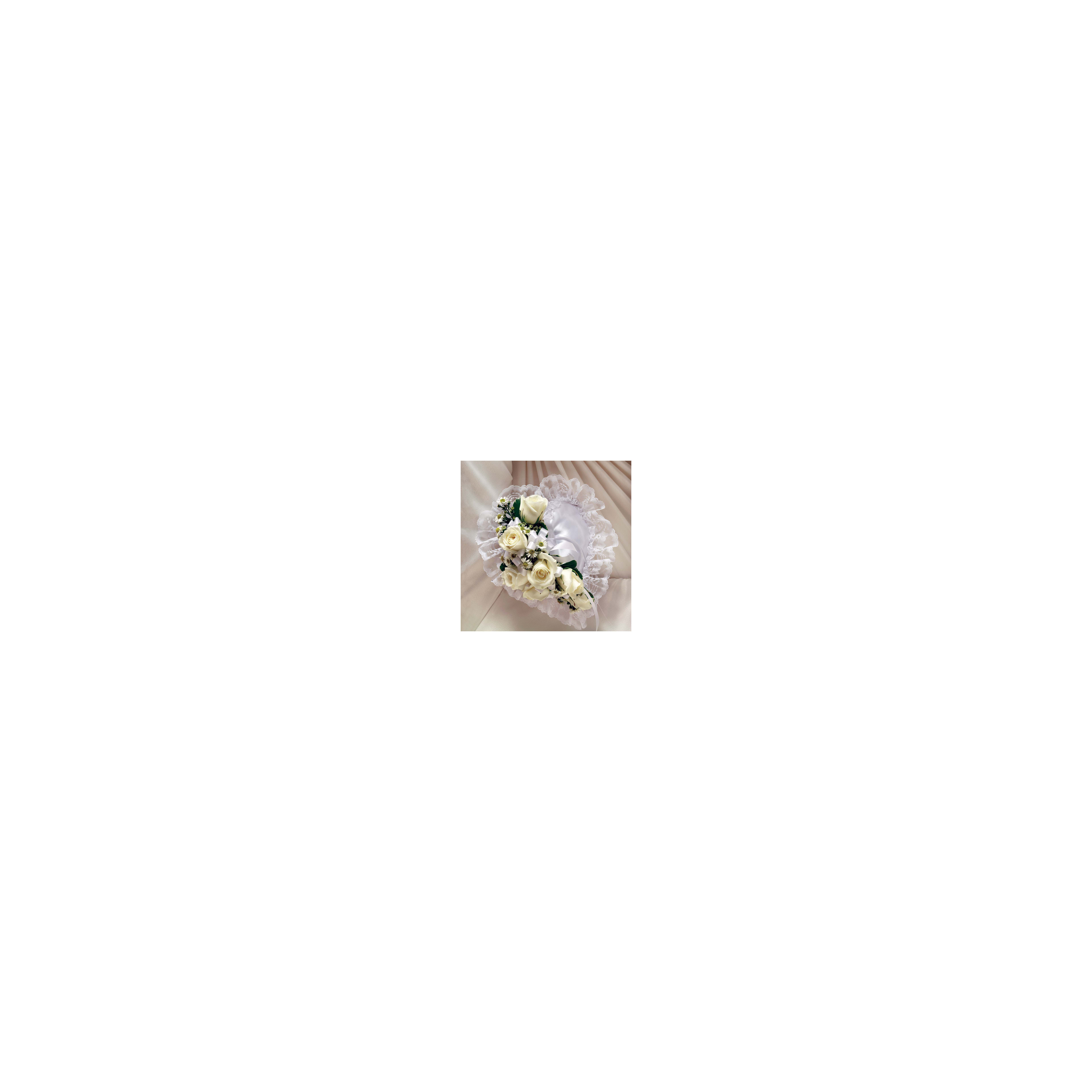 A lovely floral arrangement features white roses and daisies, elegantly placed on satin fabric.