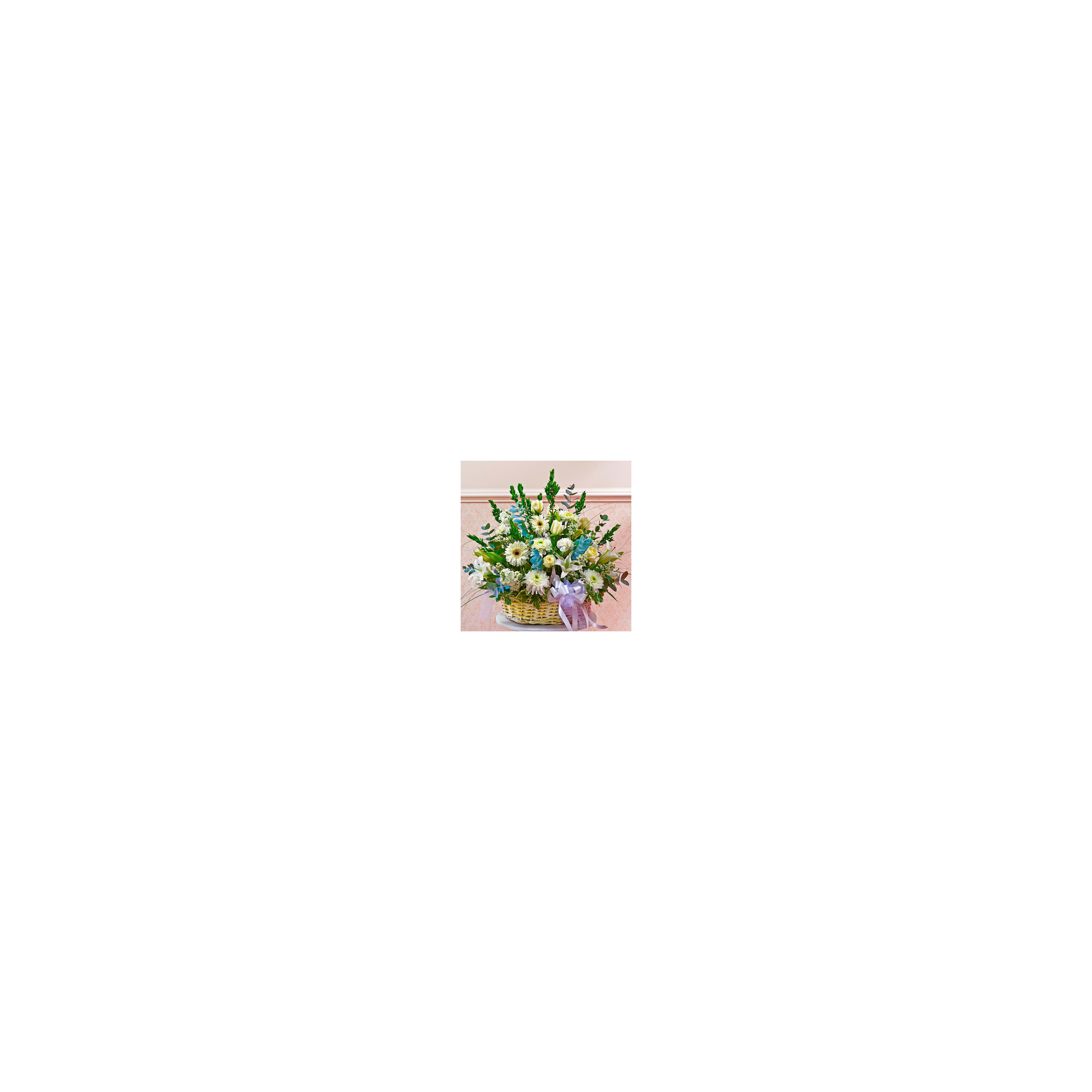 A vibrant floral arrangement features assorted flowers in a wicker basket with a bow.