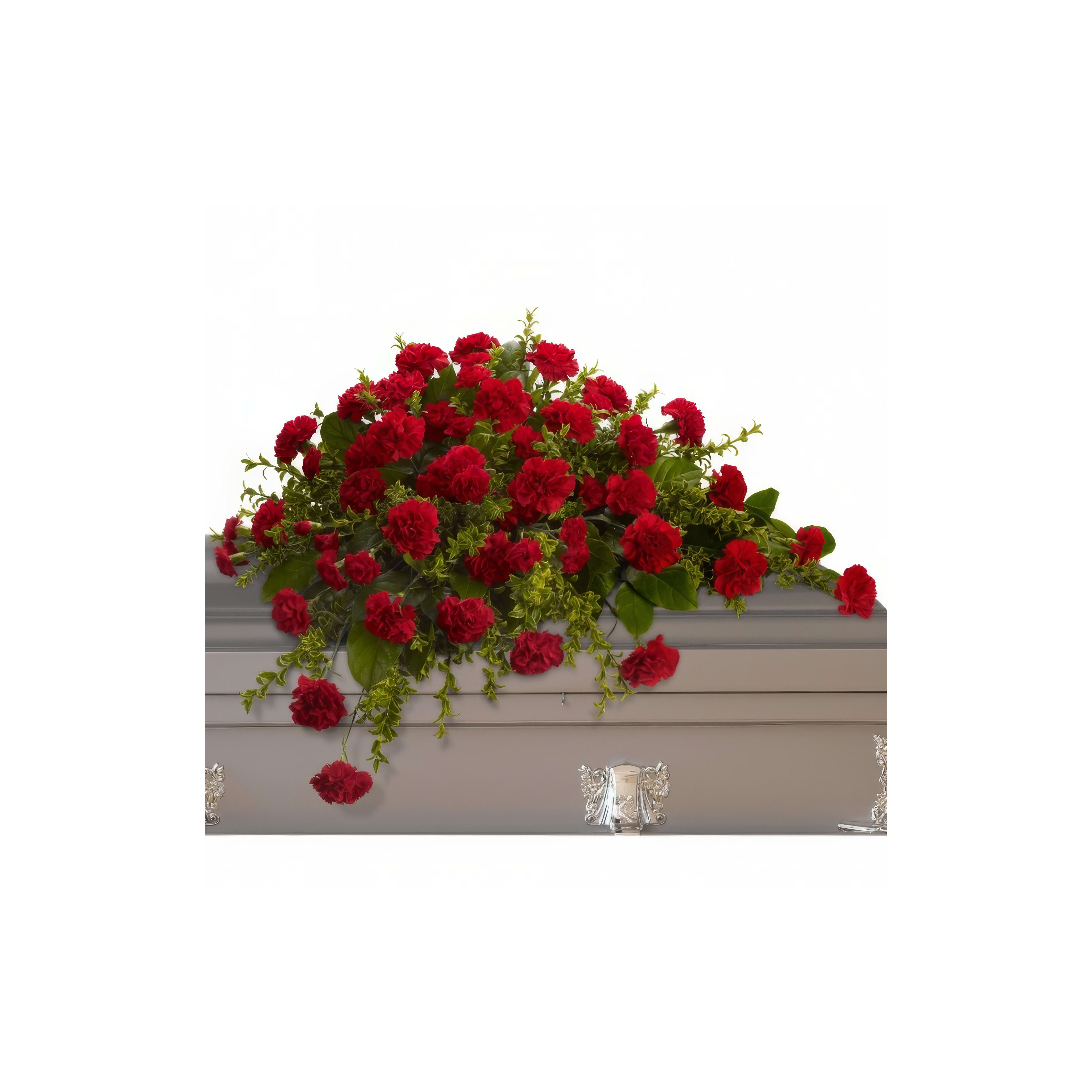 A vivid display of red roses adorns a silver casket at a memorial service in autumn.