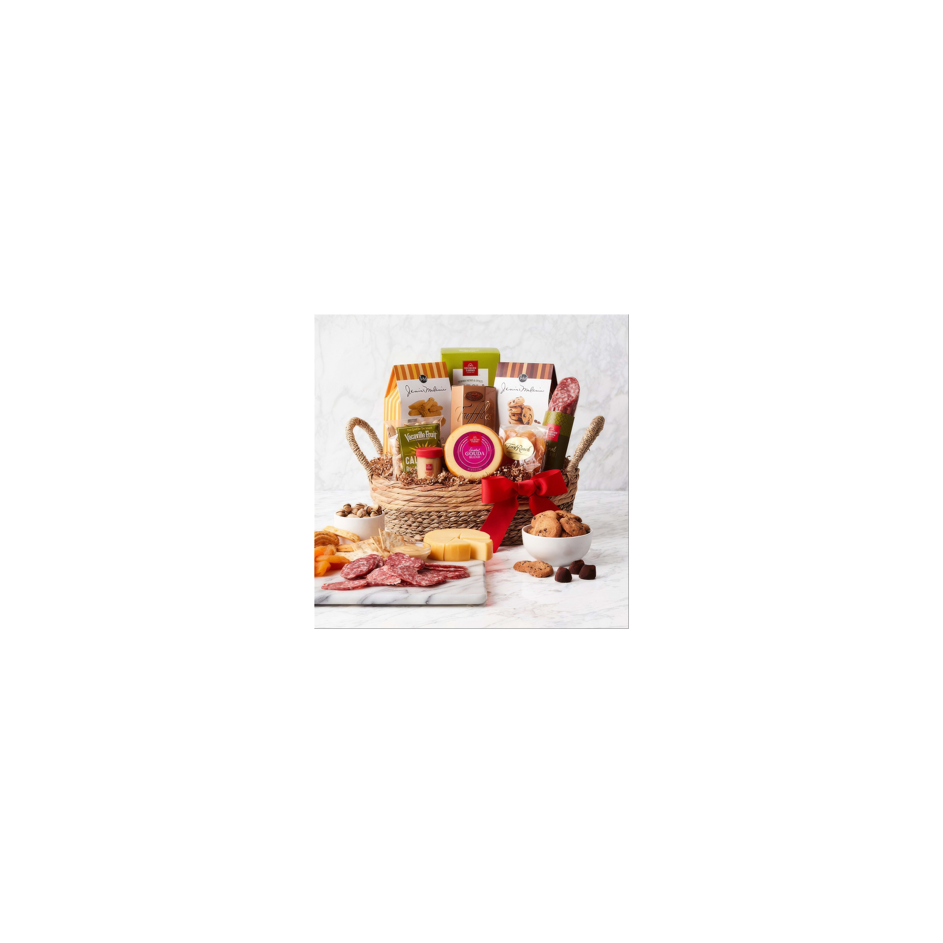 A lovely basket of gourmet snacks, including meats, cheeses, and sweets, perfect for sharing.