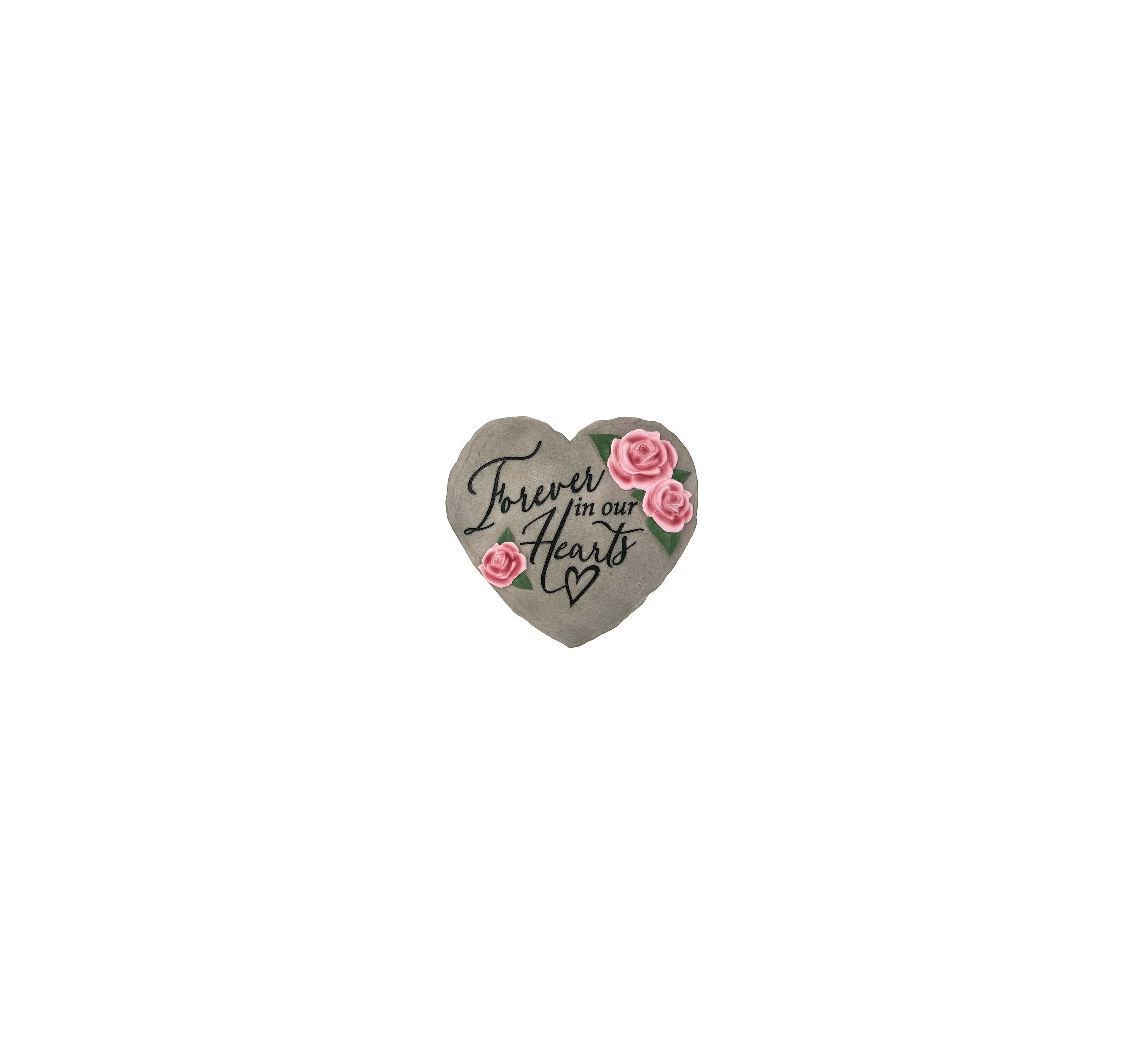 Heart-shaped stone features roses and heartfelt message, often used as a memorial tribute.