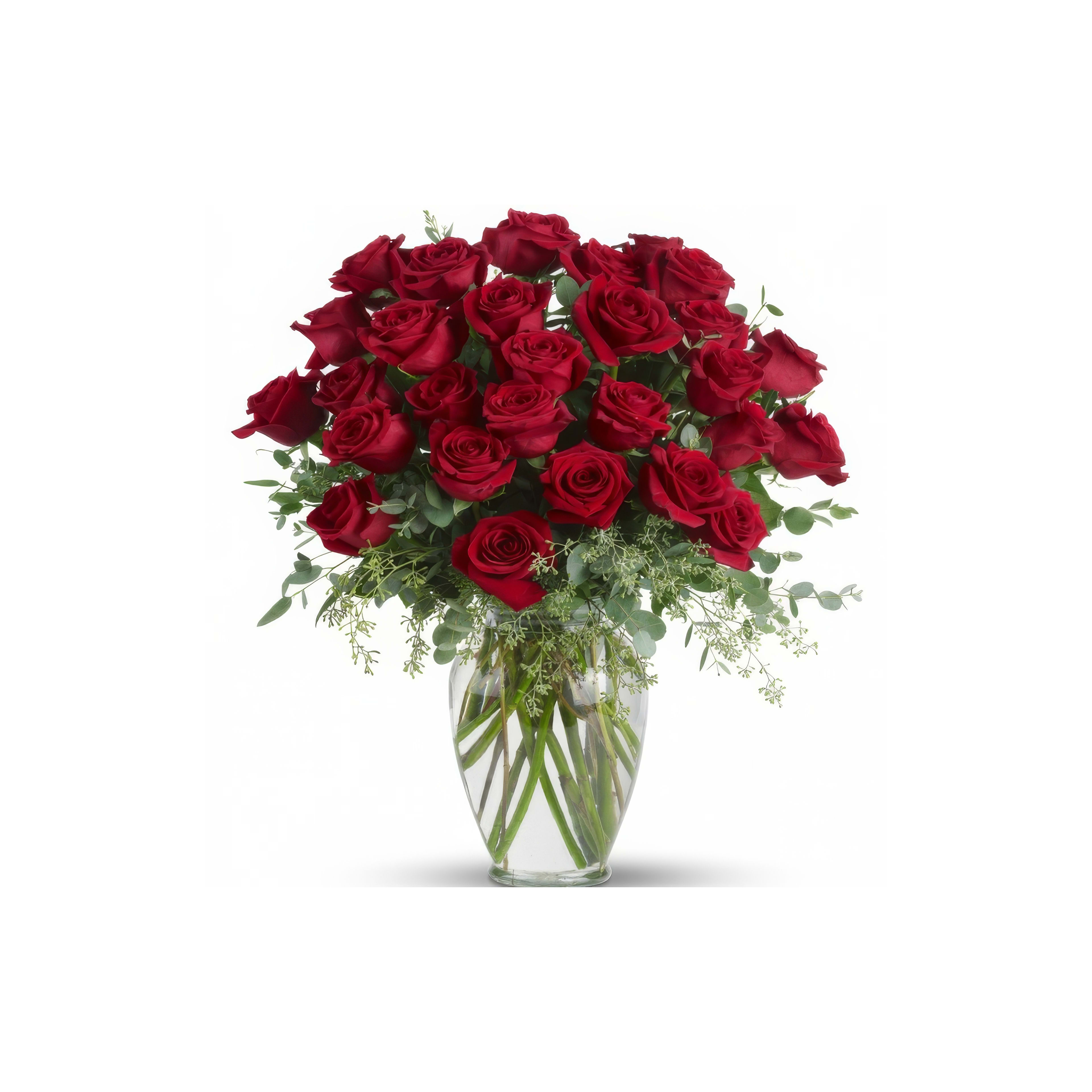 A stunning arrangement of fresh red roses in a glass vase highlights their rich color and elegance.