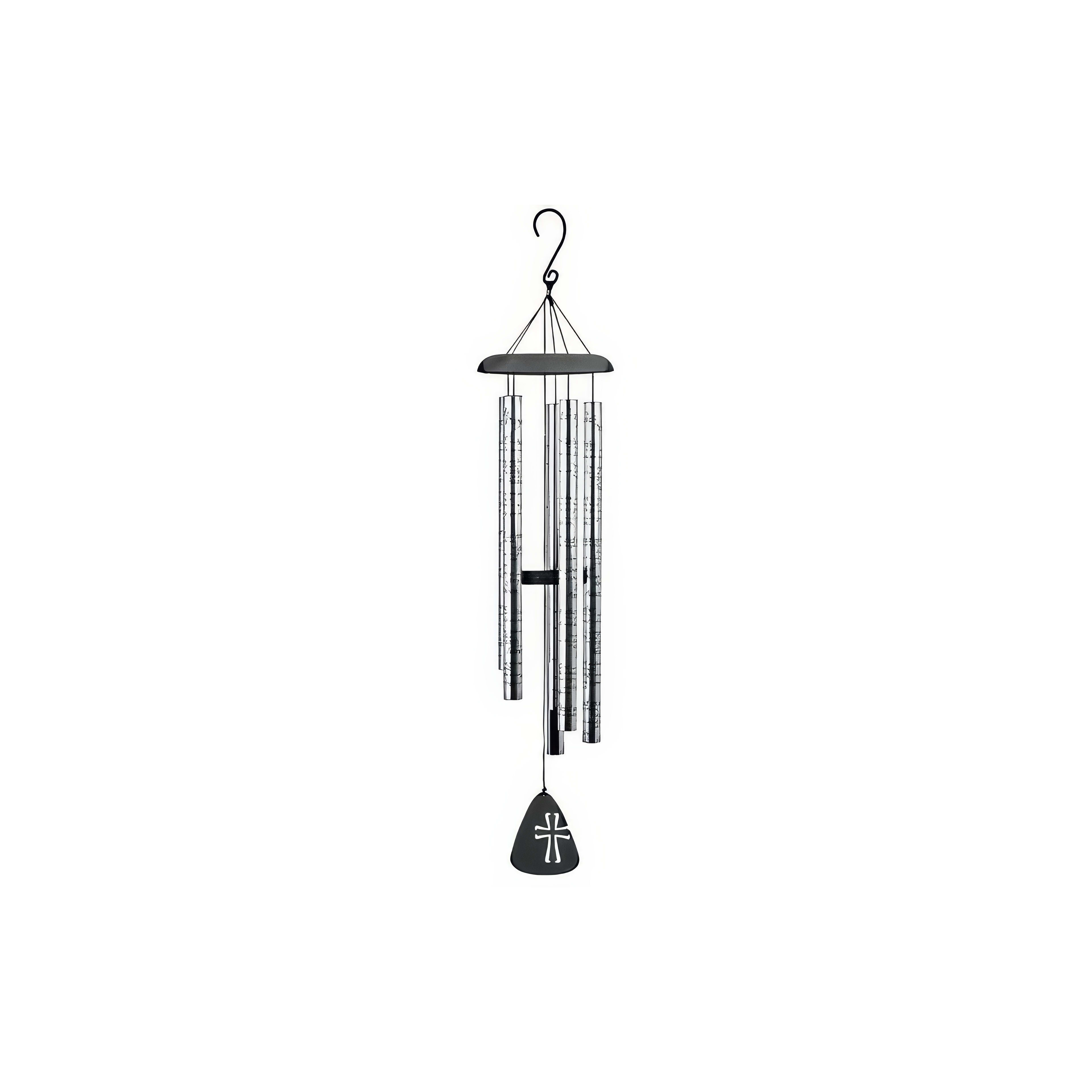Wind chimes sway gently in a tranquil garden, catching sunlight and creating soothing sounds.