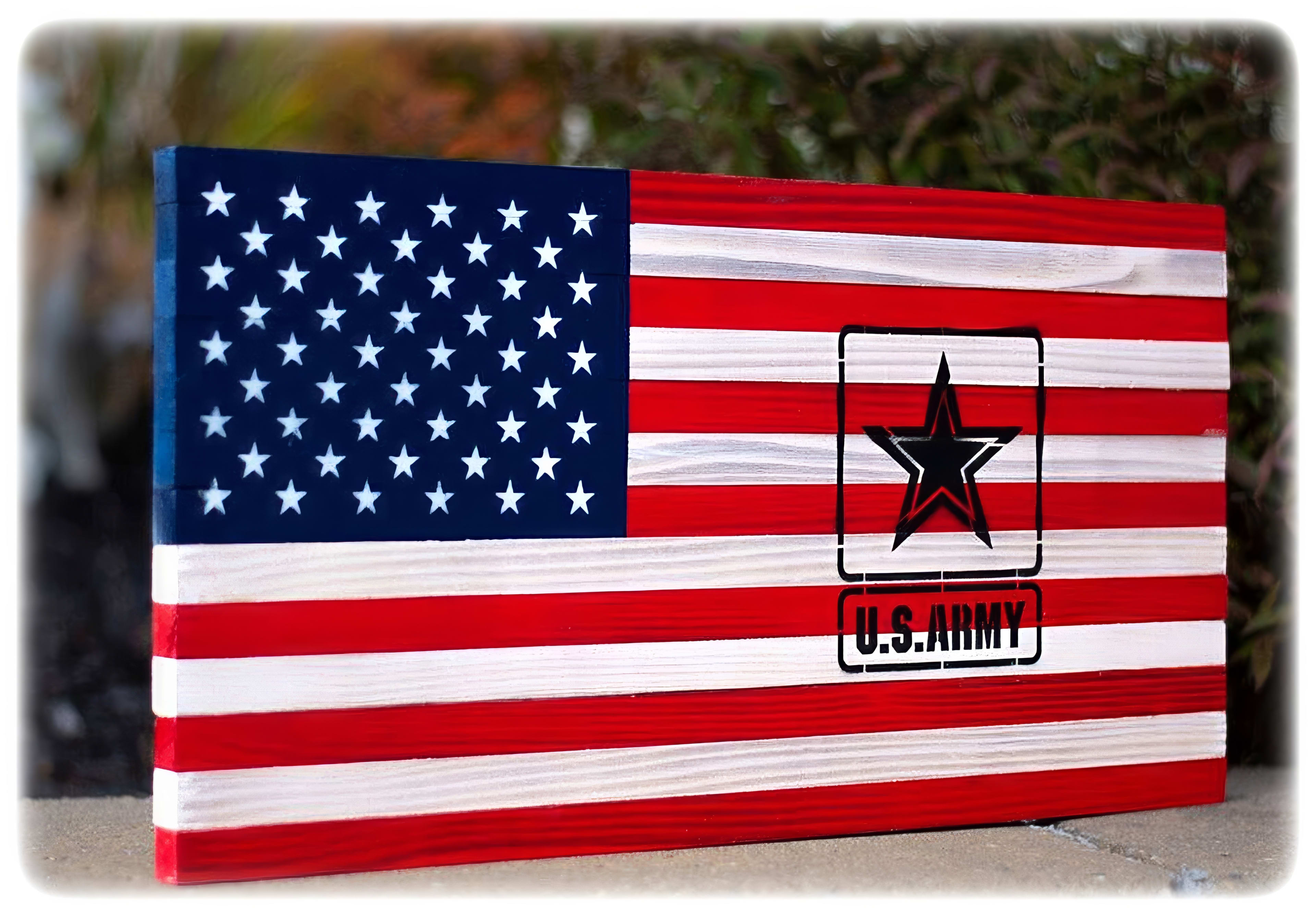 A vibrant US Army flag flutters against a clear sky, surrounded by lush greenery.