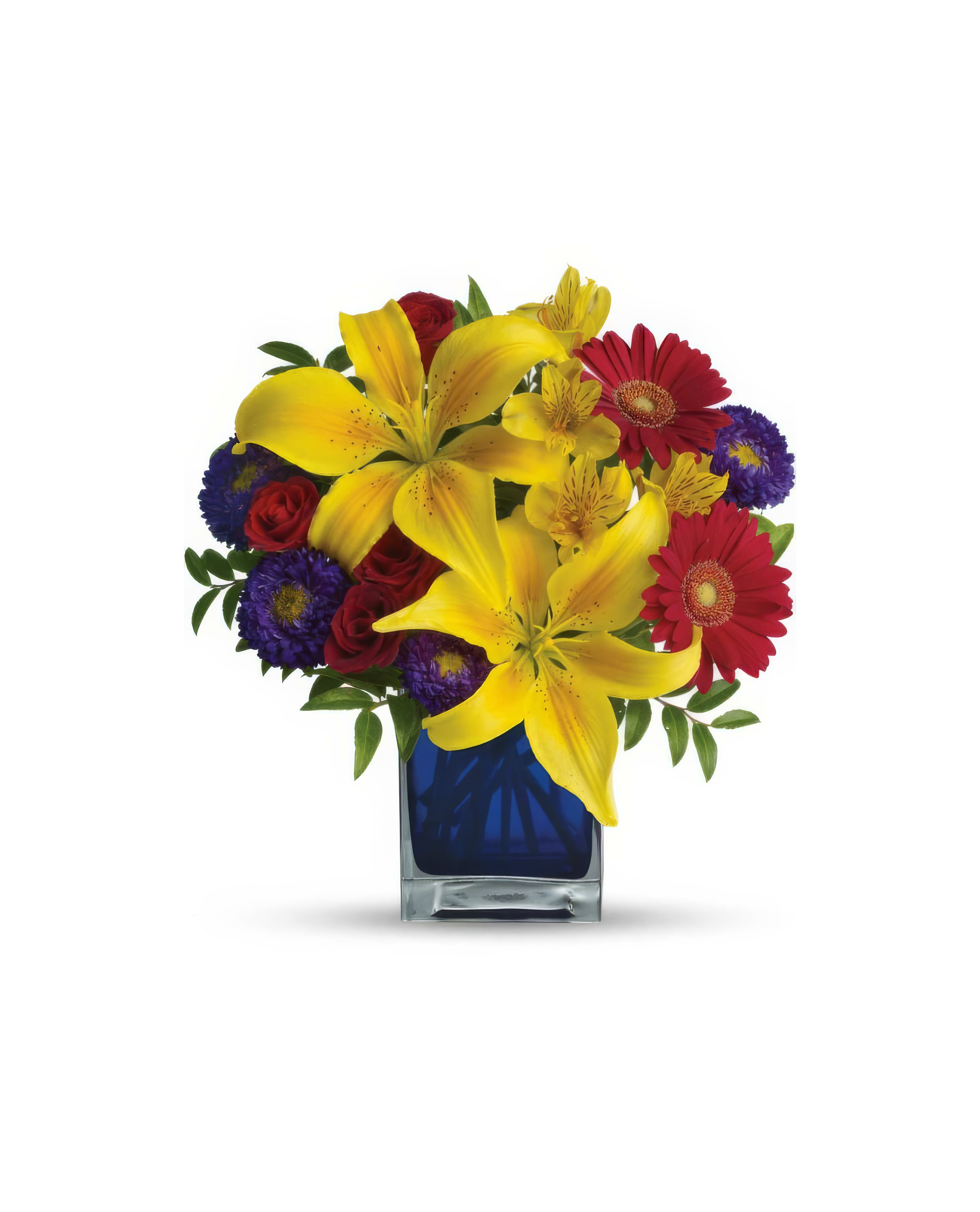 Colorful flowers in a blue vase create a cheerful centerpiece for any occasion.