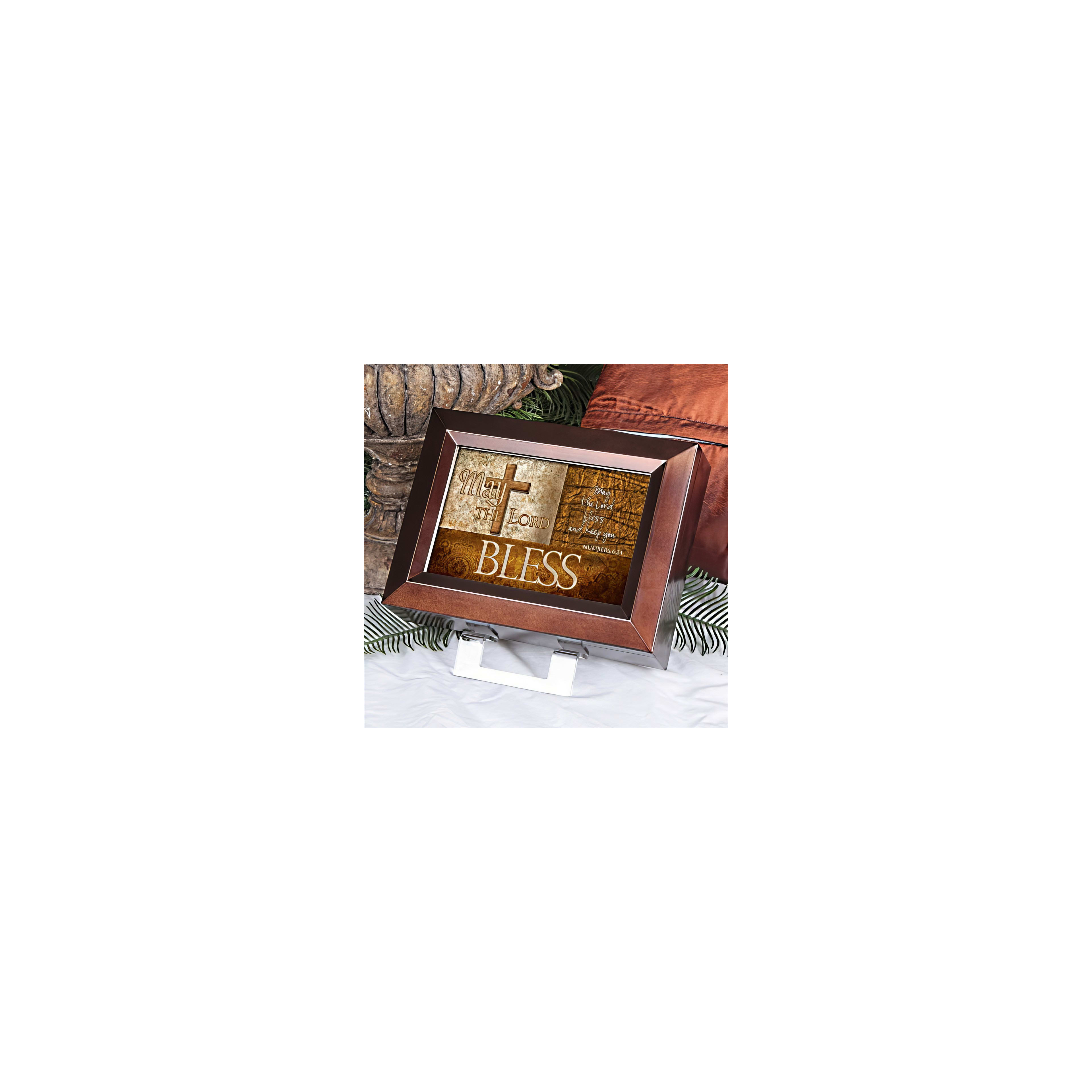 Decorative frame displays a blessing and a cross, adding warmth to the room's ambiance.