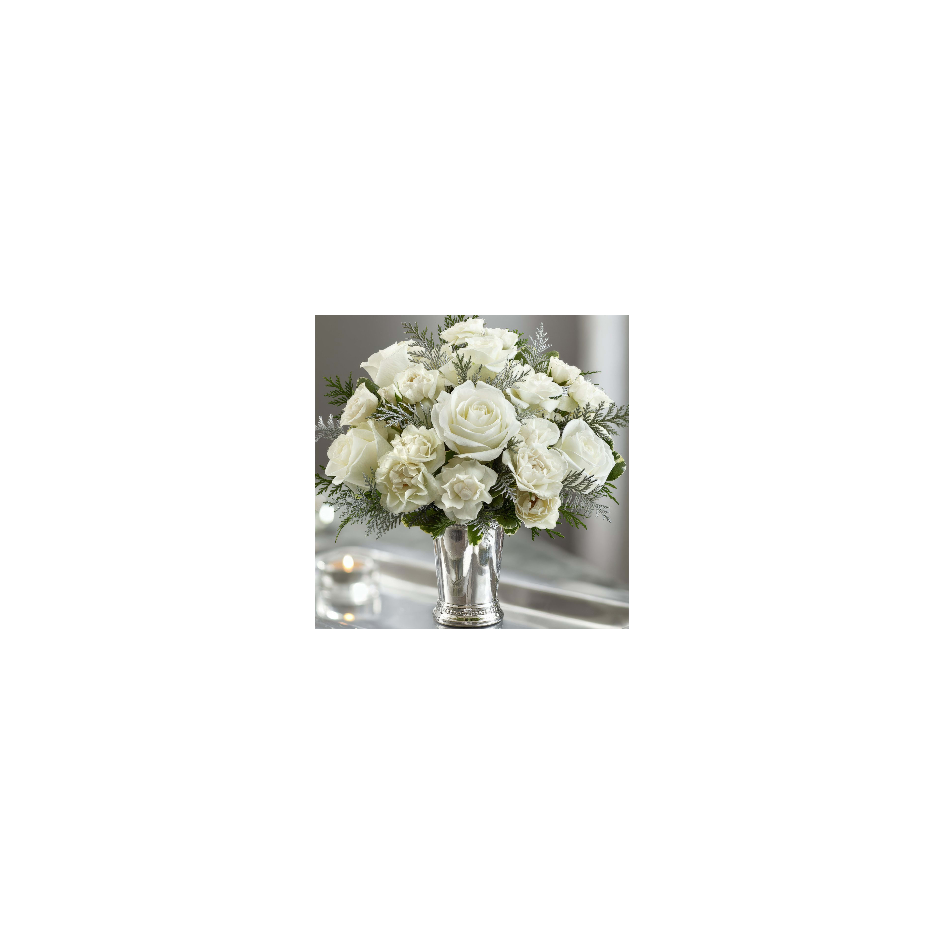 A beautiful bouquet of white roses fills a silver vase, perfect for home decor or events.