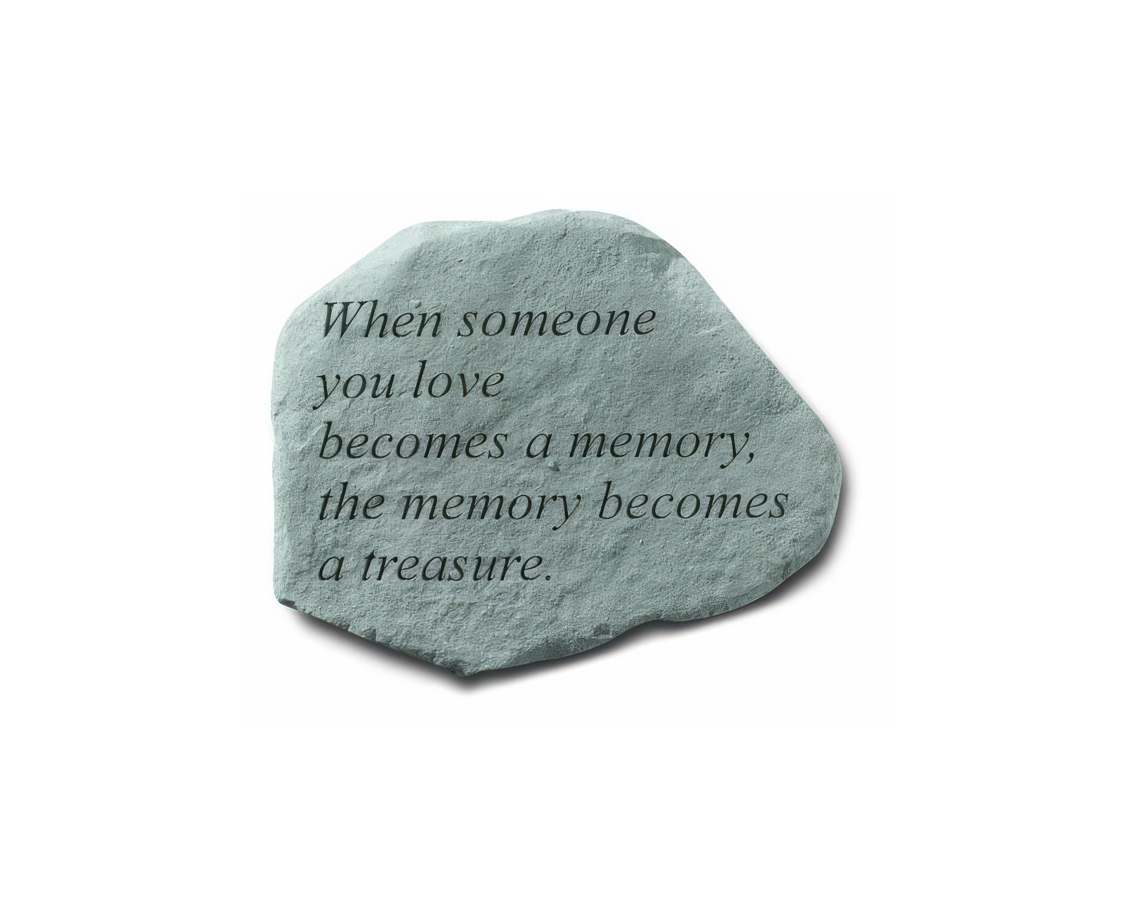 A gray stone engraving conveys a heartfelt message about love and cherished memories.