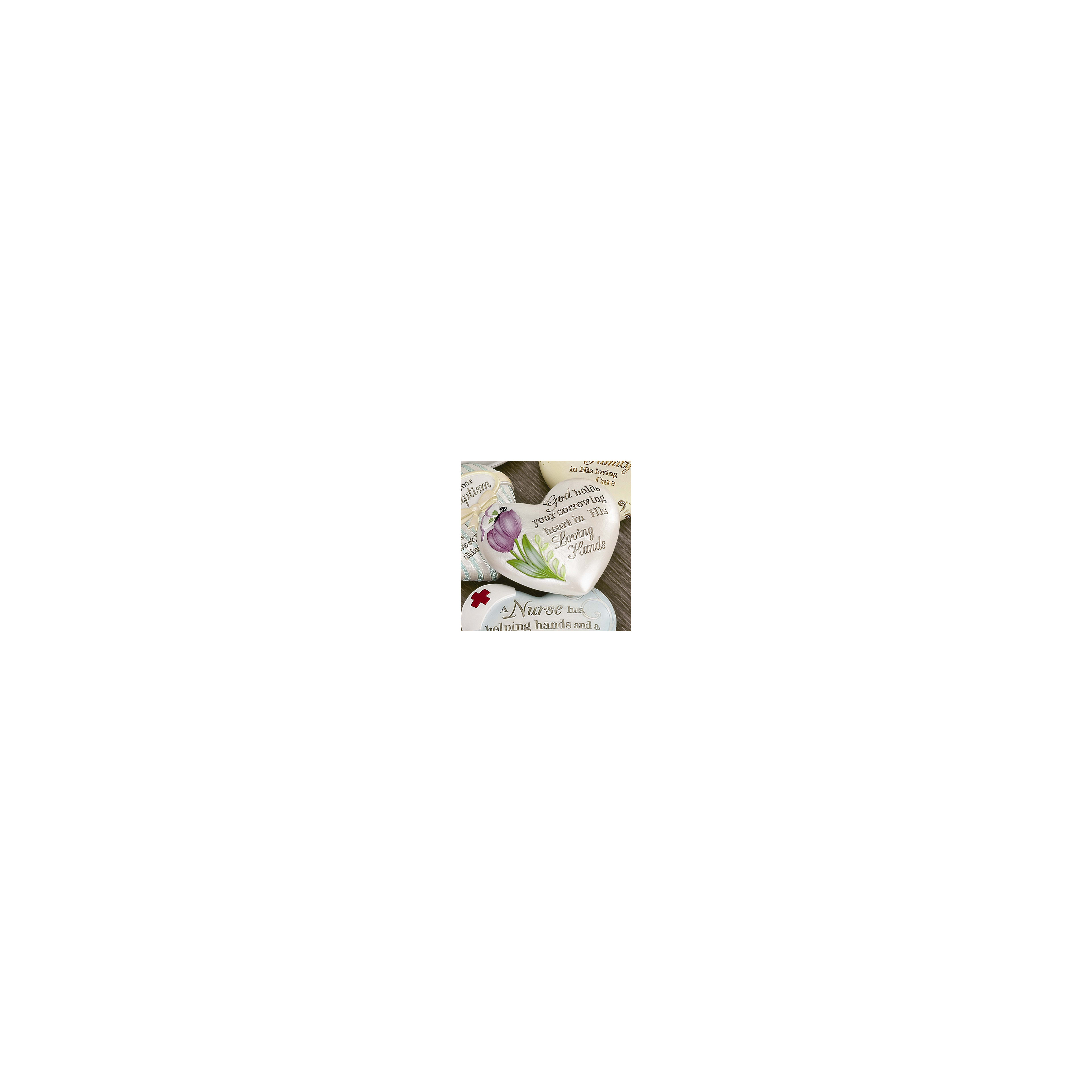 A collection of decorative heart-shaped items featuring uplifting messages about love and care.