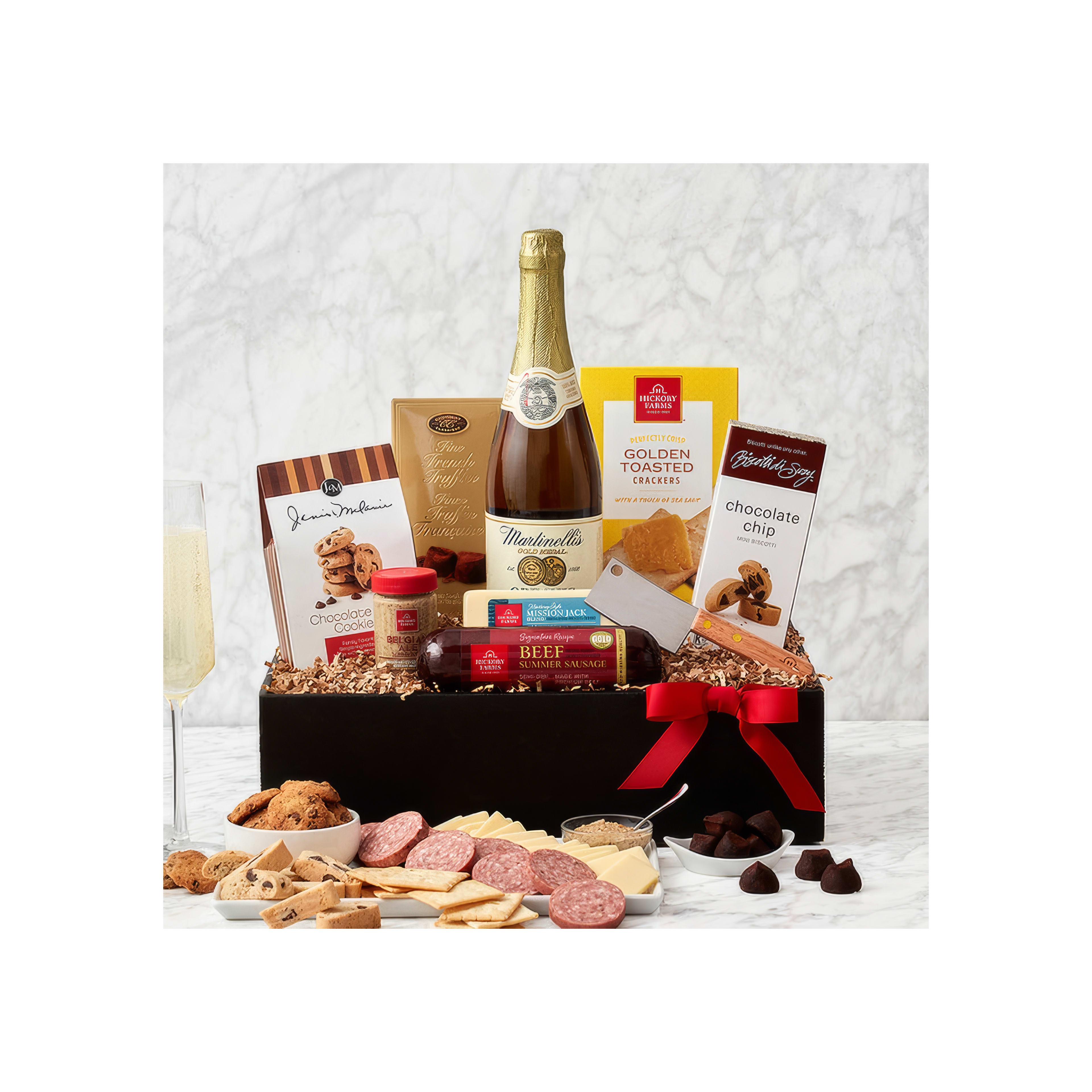 Delicious assortment of cookies, meats, chocolates, and wine presented in a decorative gift basket.