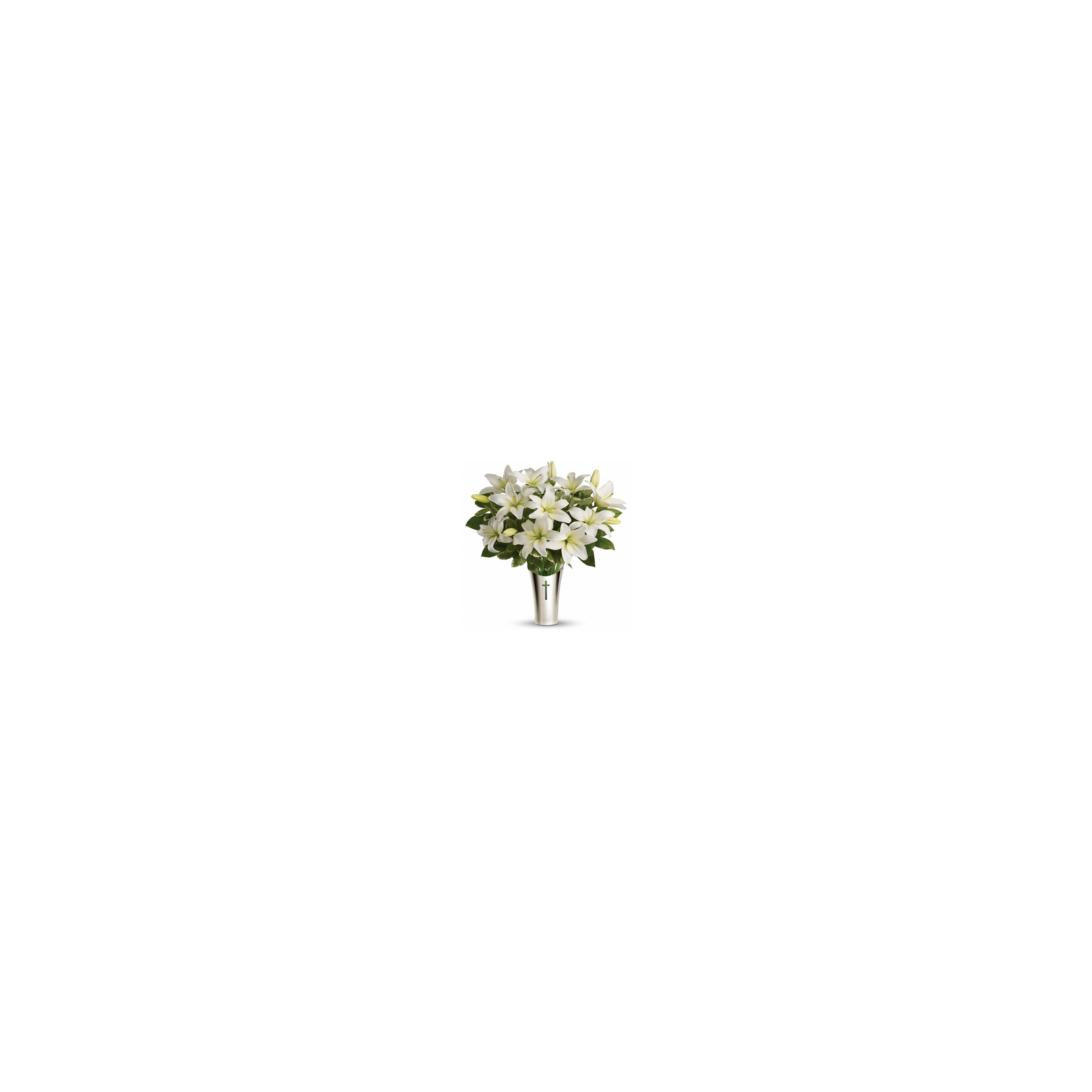 White lilies are arranged beautifully, showcasing their petals and green leaves in a silver vase.