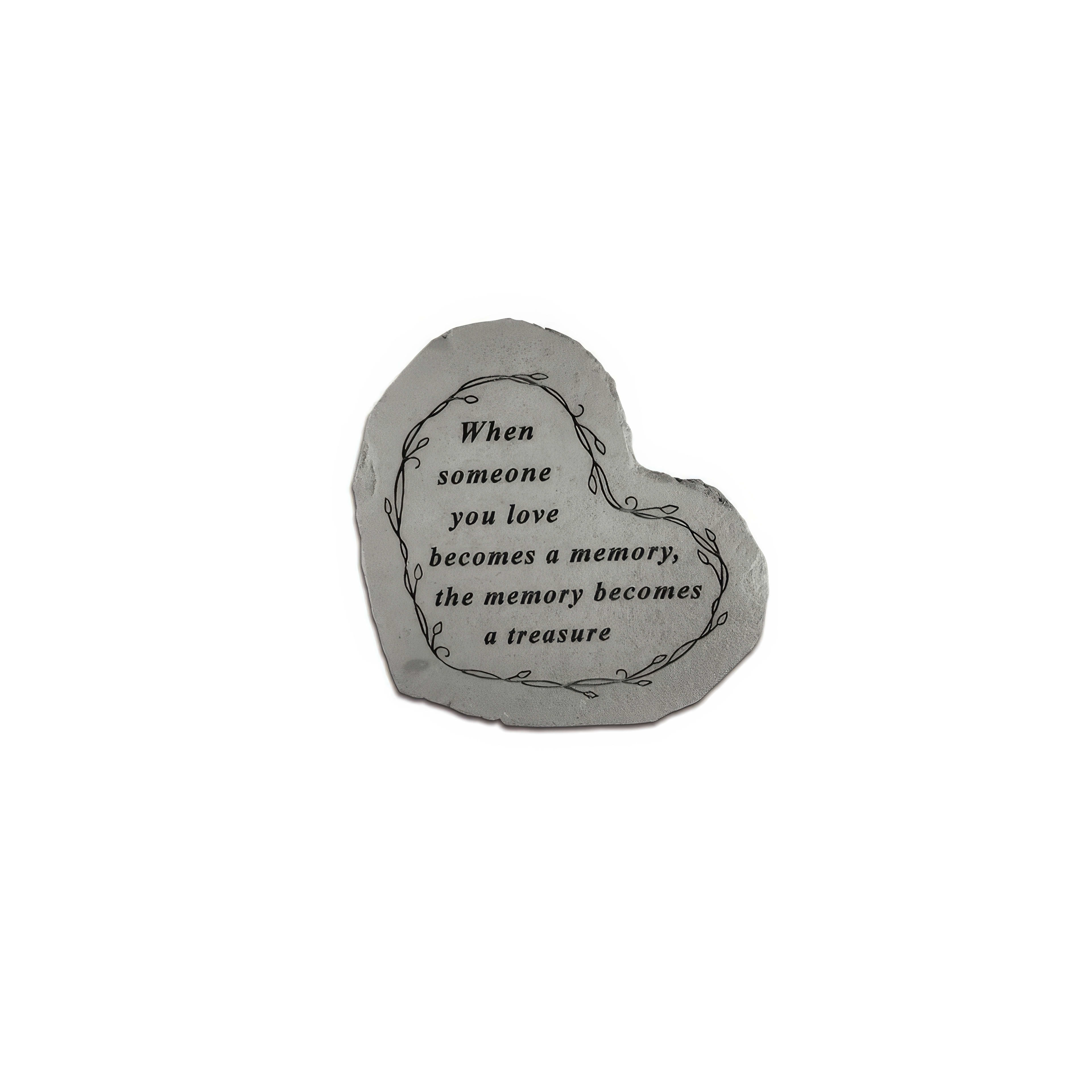 A heart-shaped stone inscribed with love and memories evokes deep connection.