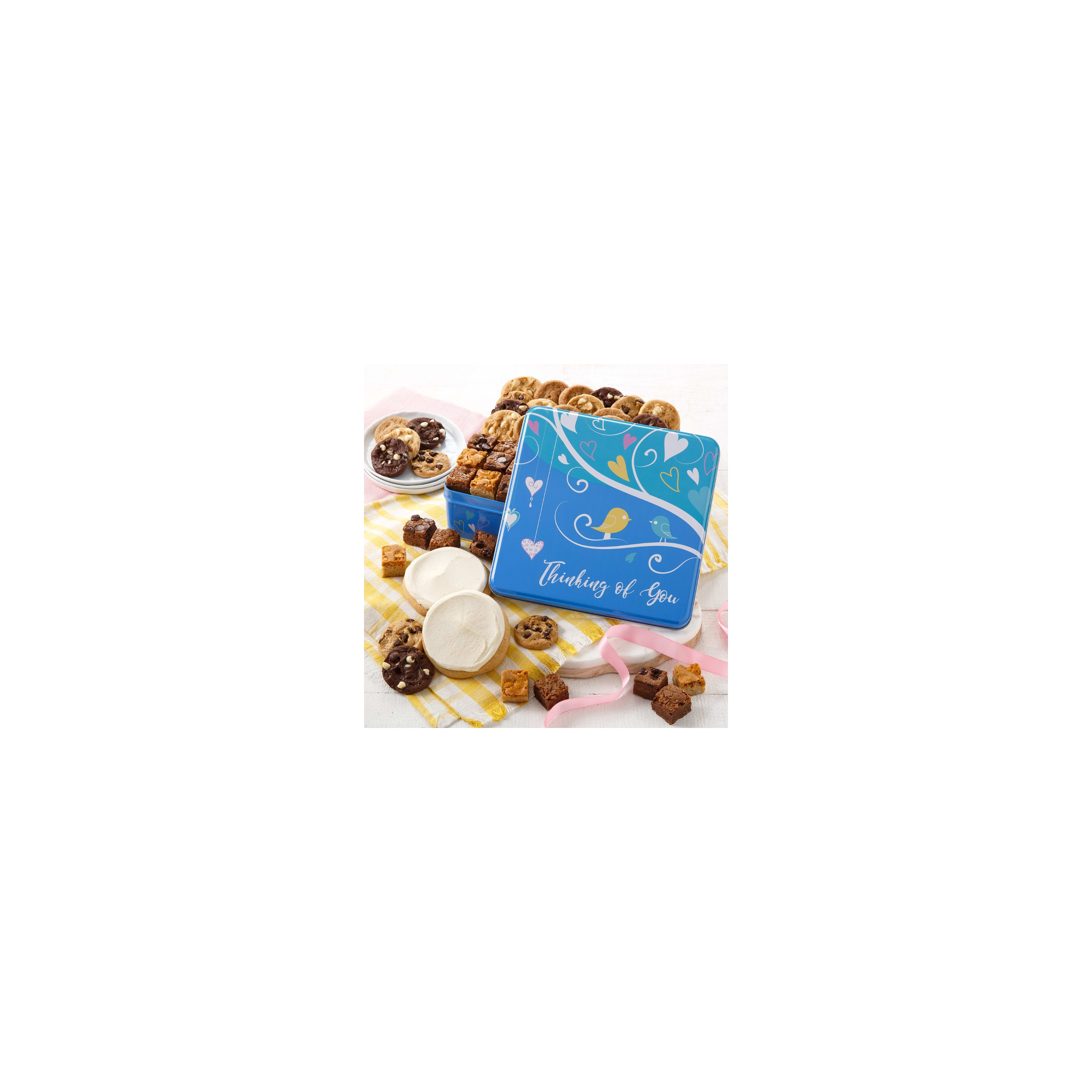 A vibrant cookie tin filled with assorted cookies and brownies on a cheerful table.