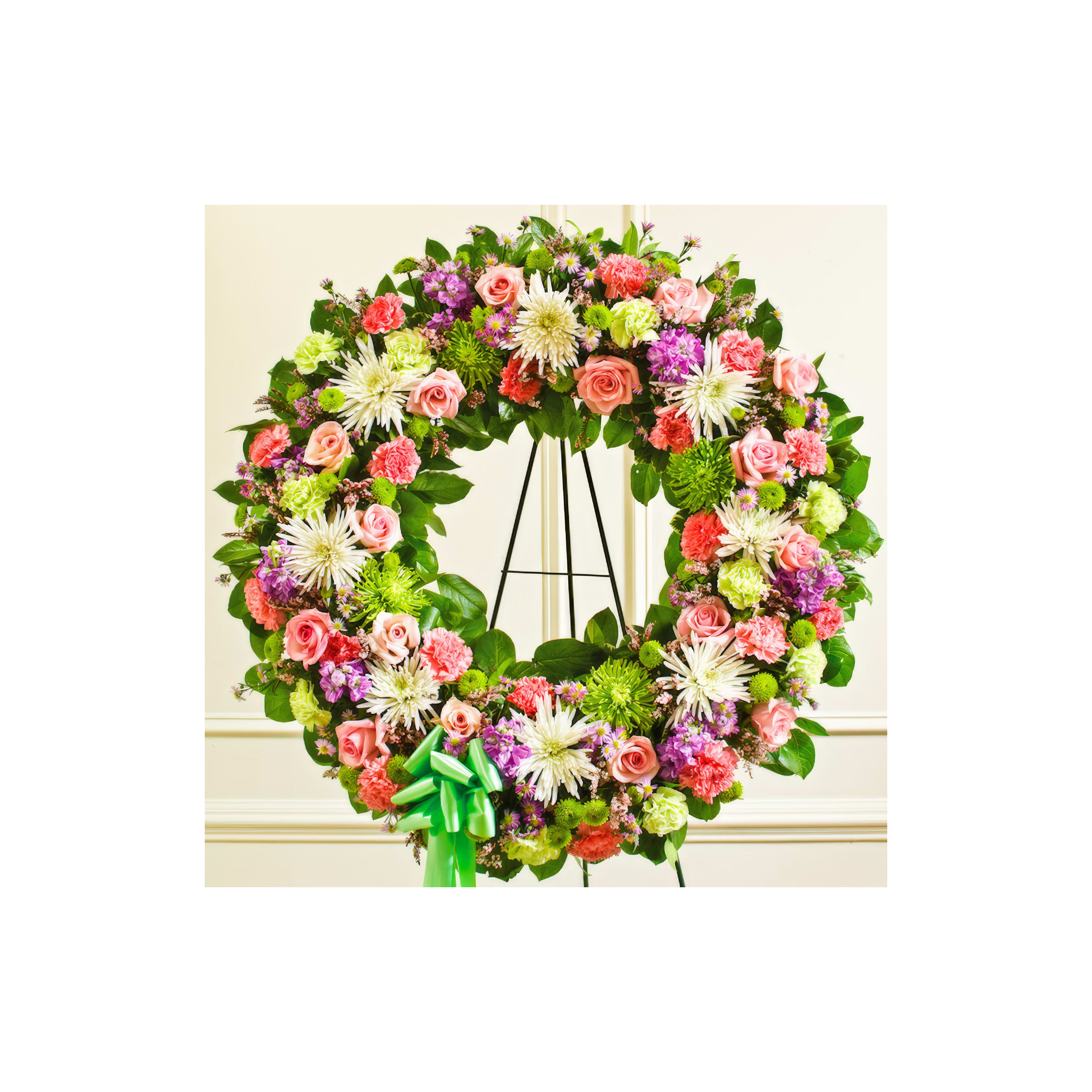 A stunning arrangement of flowers showcases pink roses, white daisies, and green accents on display.