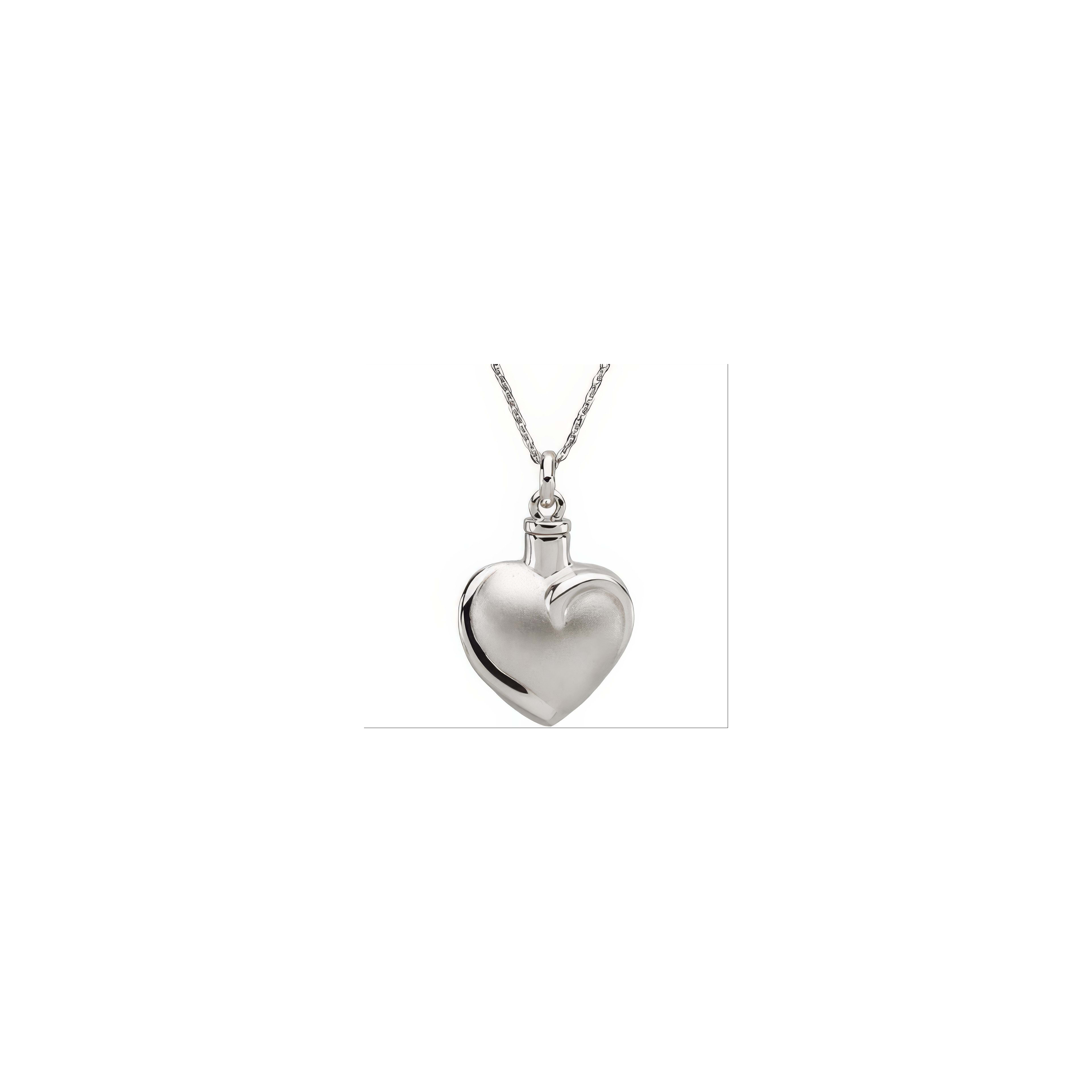 A silver heart pendant hangs from a thin chain, showcasing a smooth surface and elegant design.