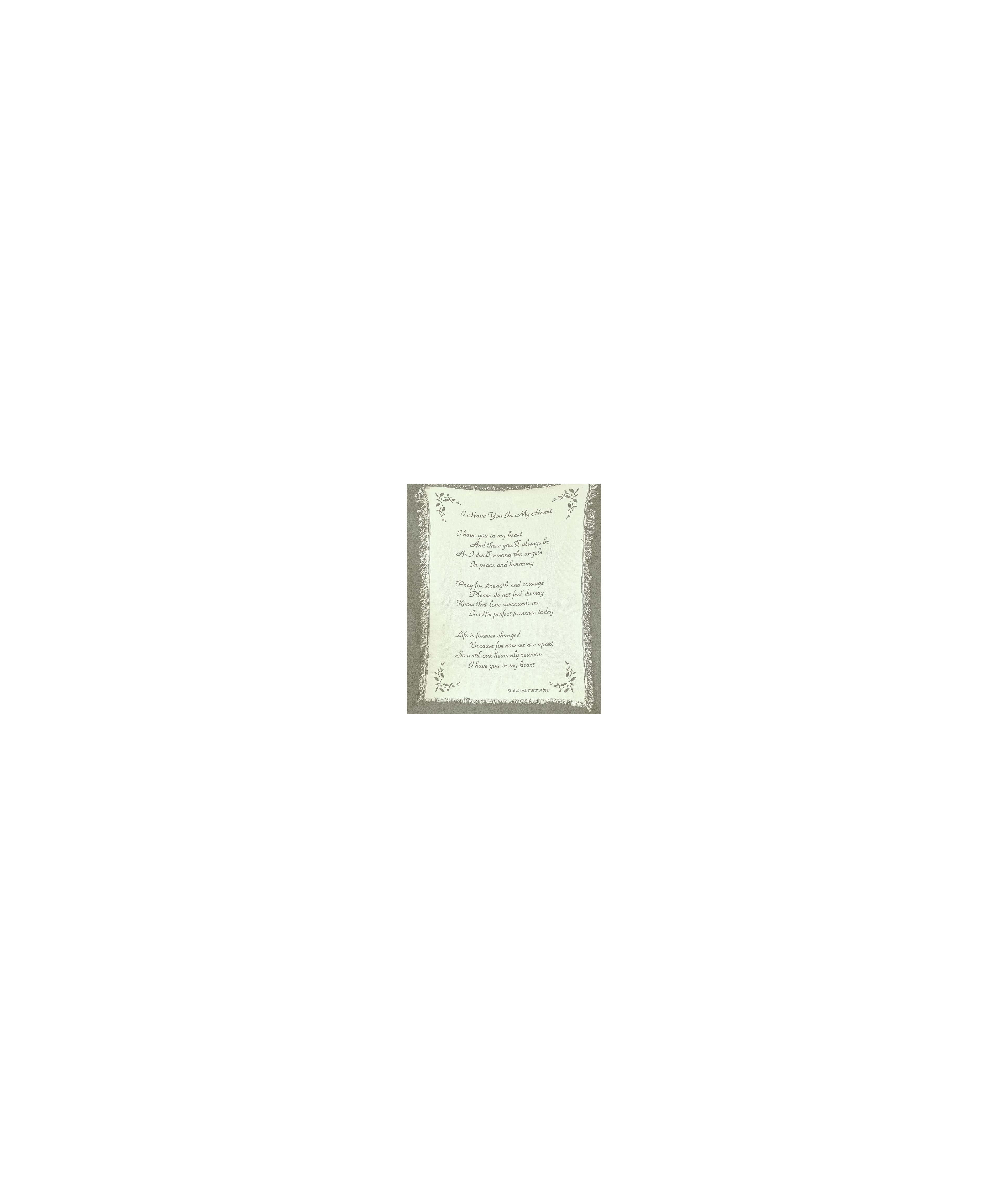 A decorative blanket with a loving poem invites reflection and comfort.