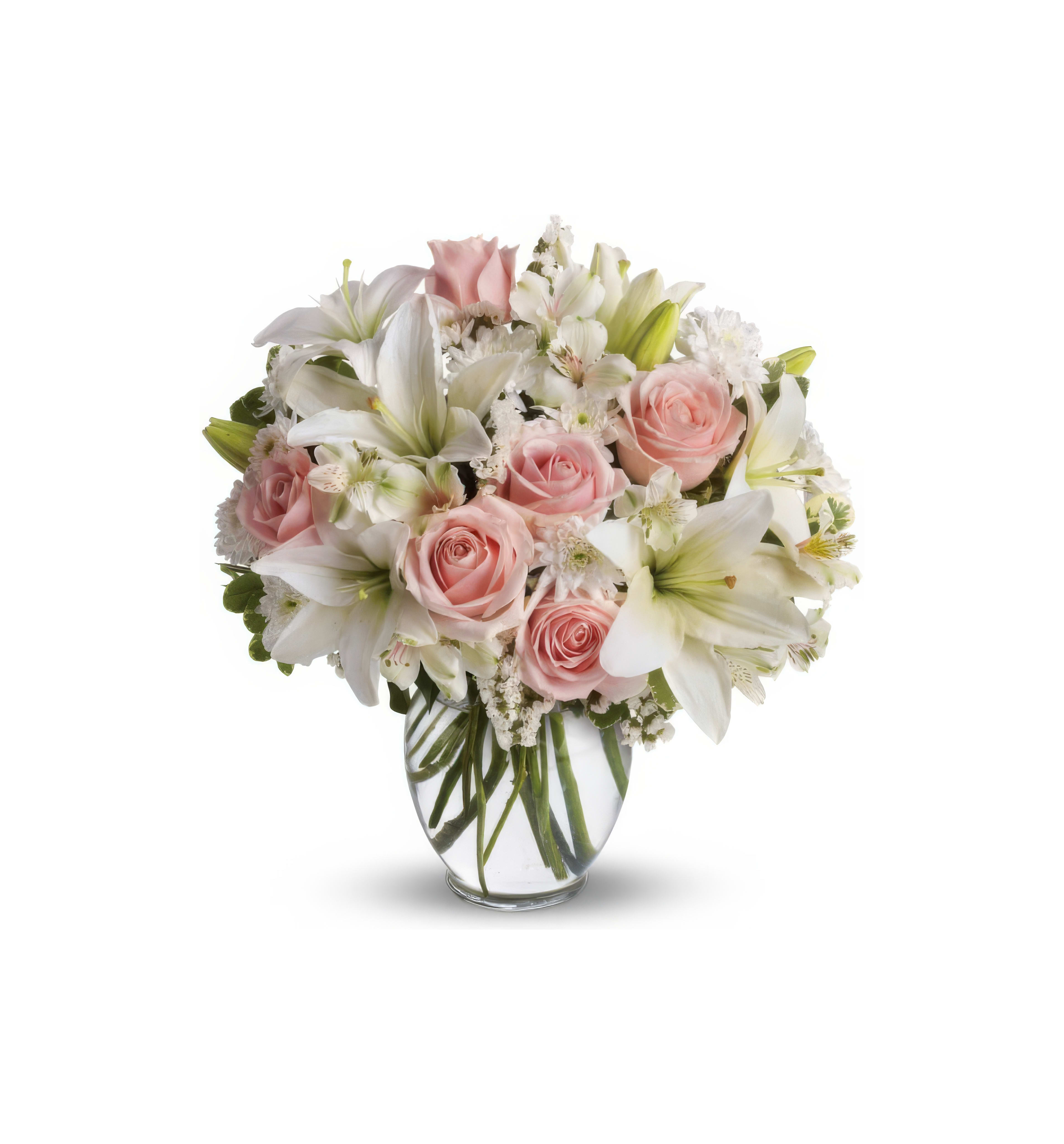 Elegant floral composition with pink roses and white lilies, perfect for enhancing any space.