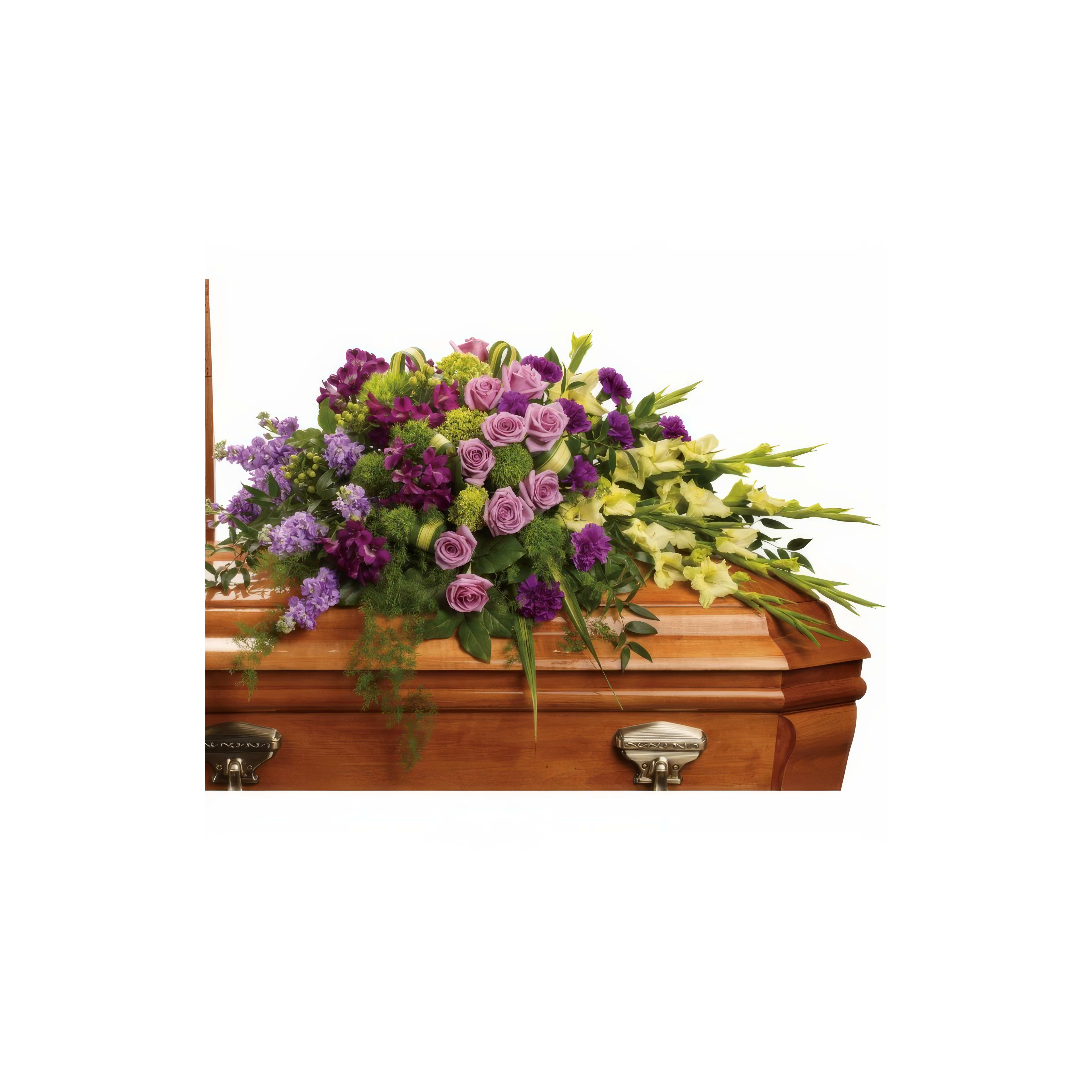 A beautiful display of vibrant flowers adorns a casket, providing a heartfelt tribute at a memorial.