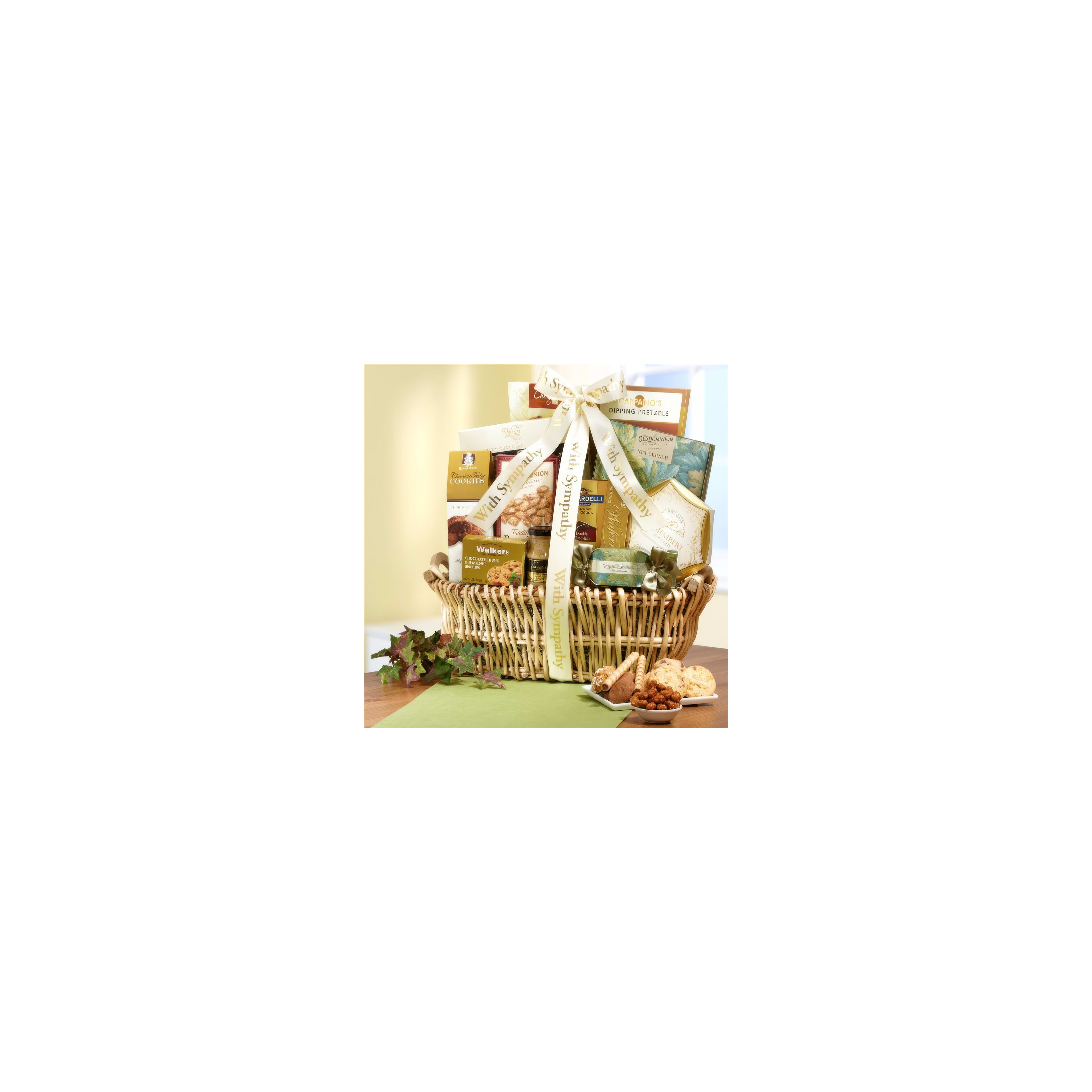 A beautifully arranged gift basket sits on a wooden table, showcasing assorted snacks.