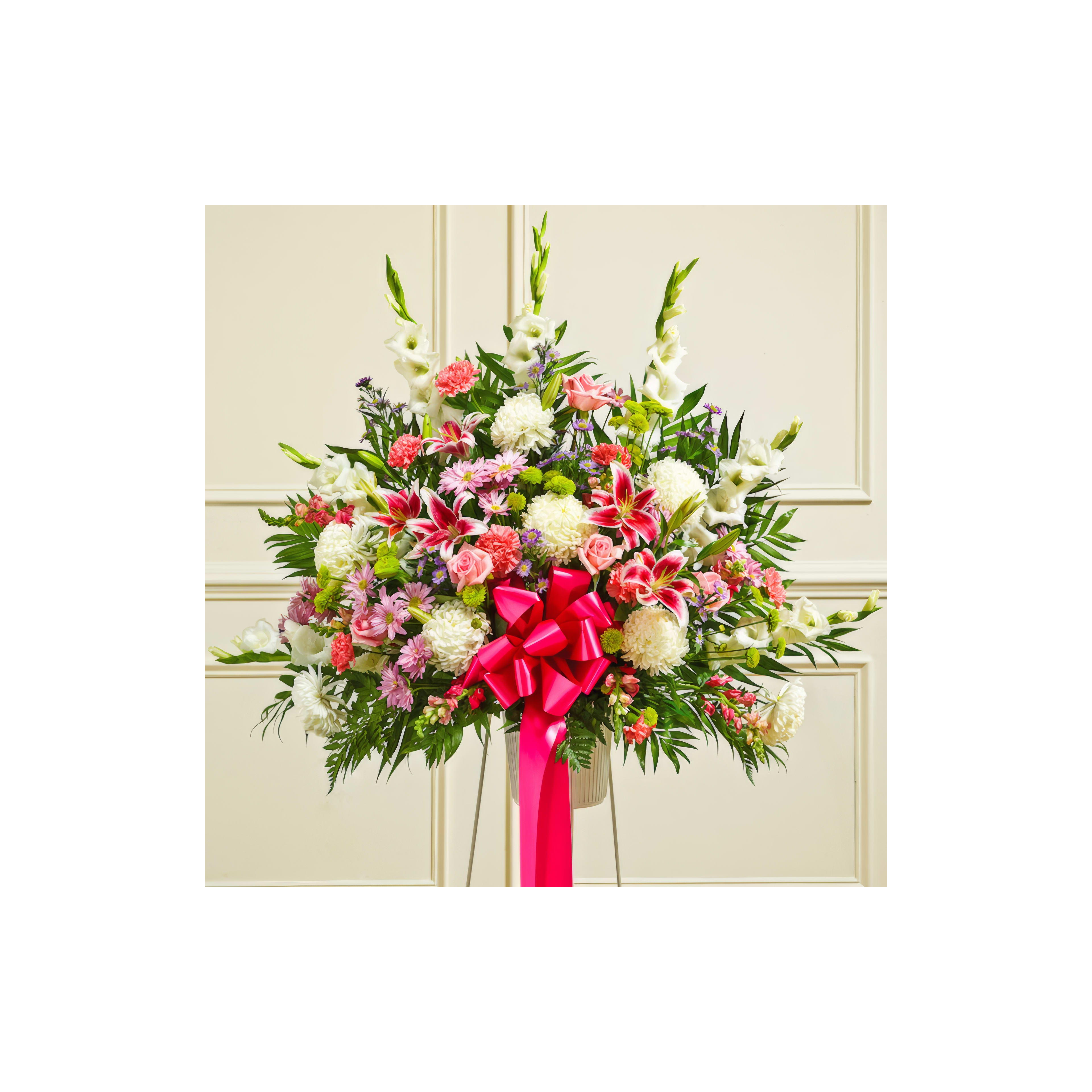 A vibrant bouquet of colorful flowers tied with a pink ribbon for special occasions.