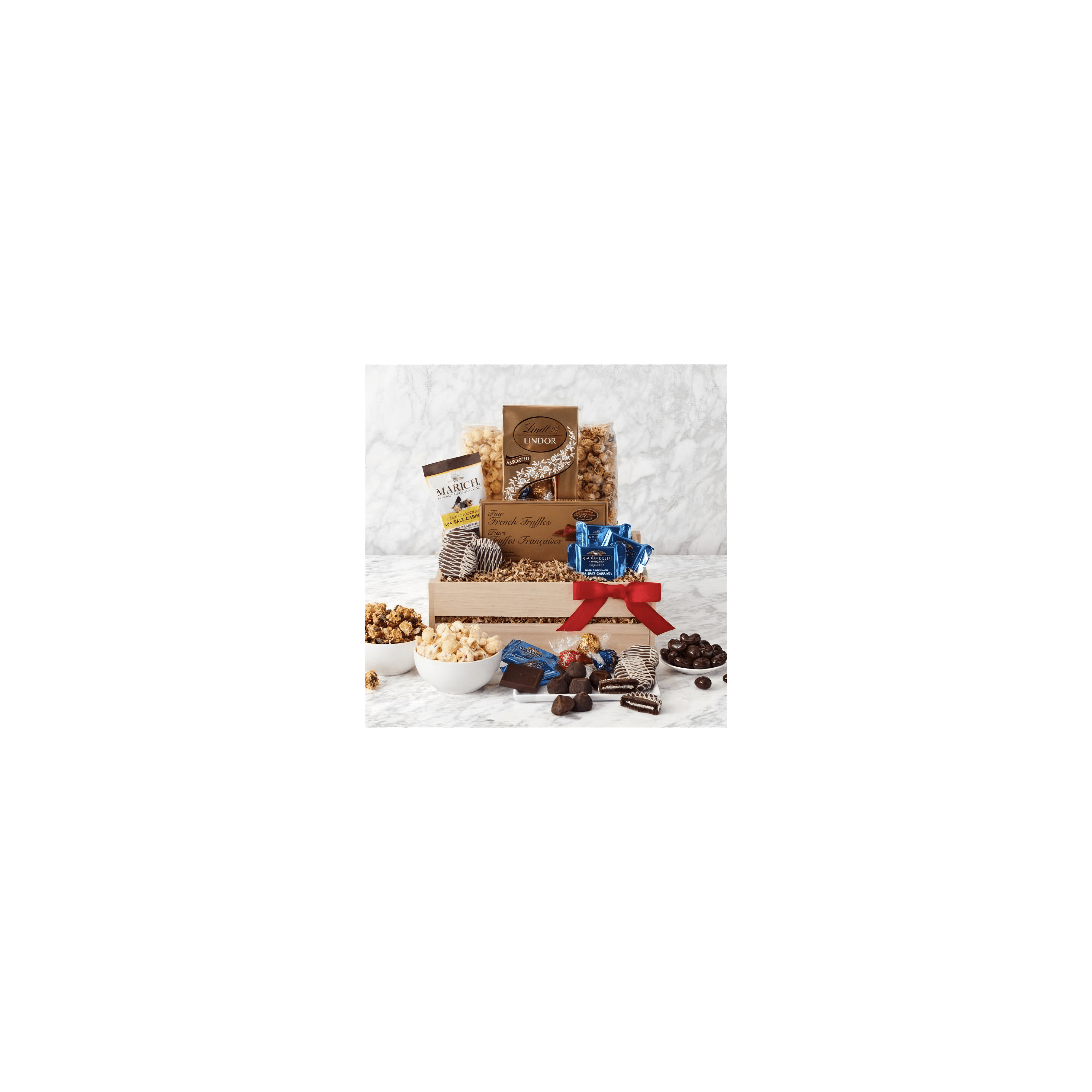 A beautifully arranged gift basket of chocolates, candies, and popcorn for any celebration.