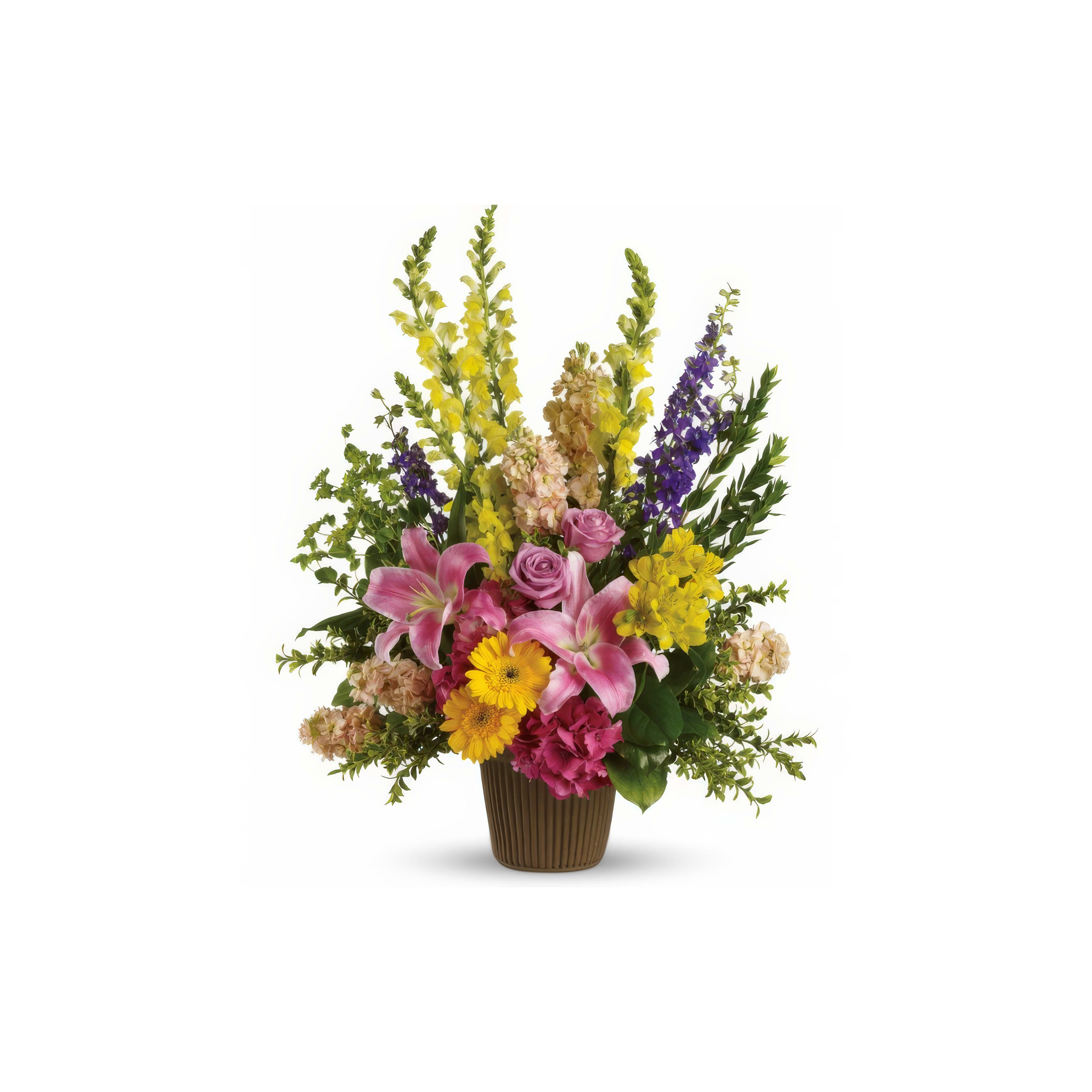Vibrant flowers including lilies and roses arranged beautifully in a rustic container.