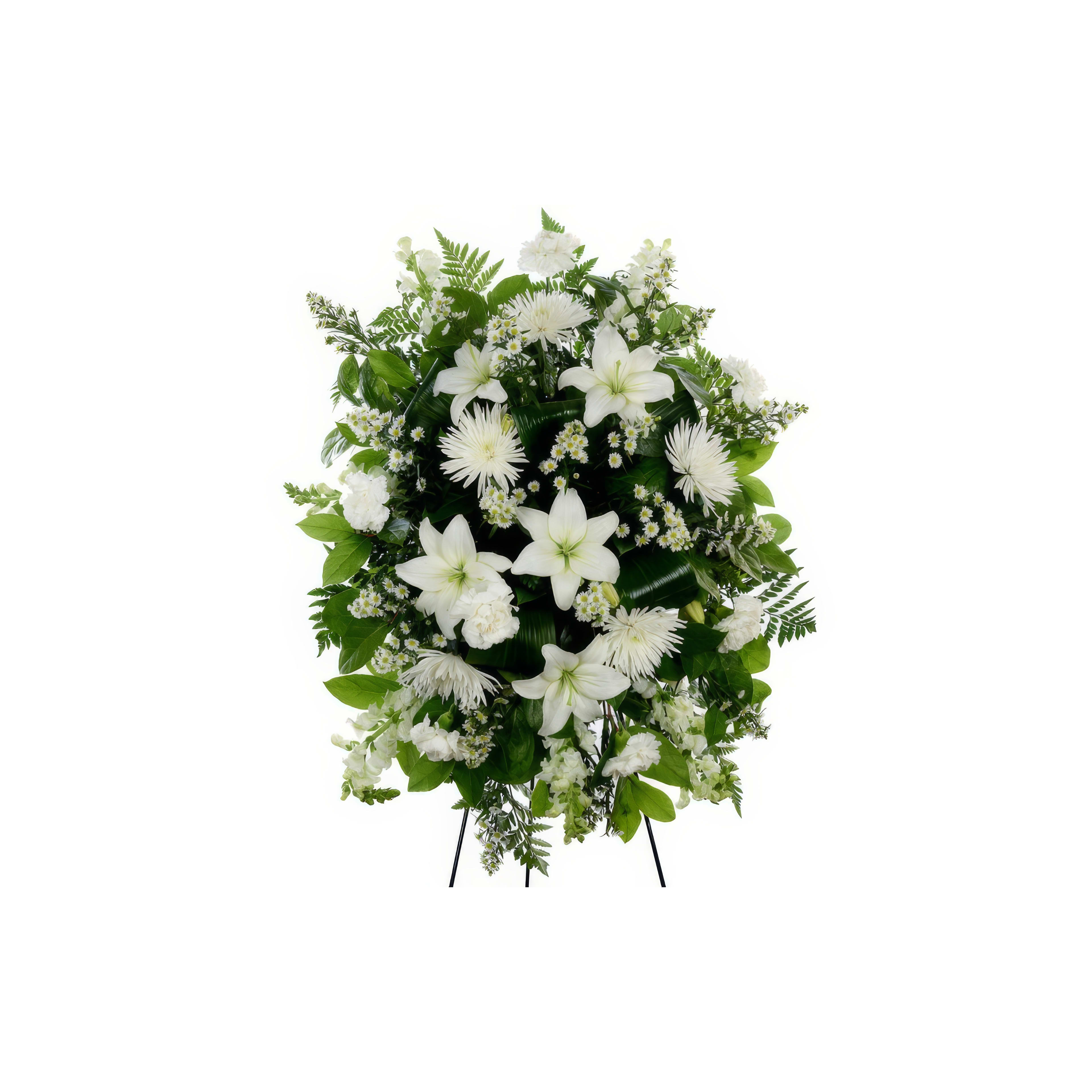 Elegant white lilies and flowers form a serene tribute display.