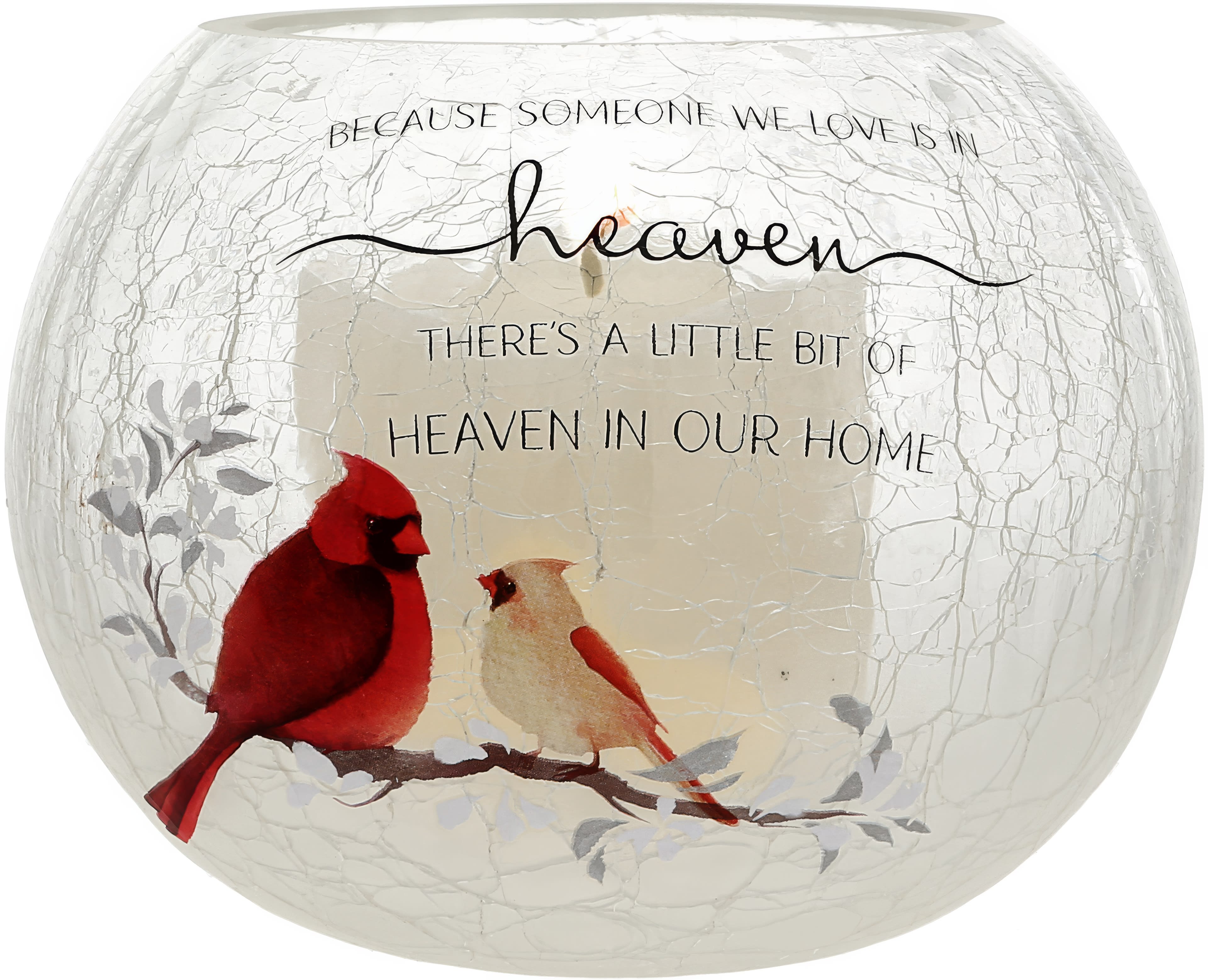 Beautiful glass bowl with red and white birds, featuring a heartfelt message about heaven in a home.