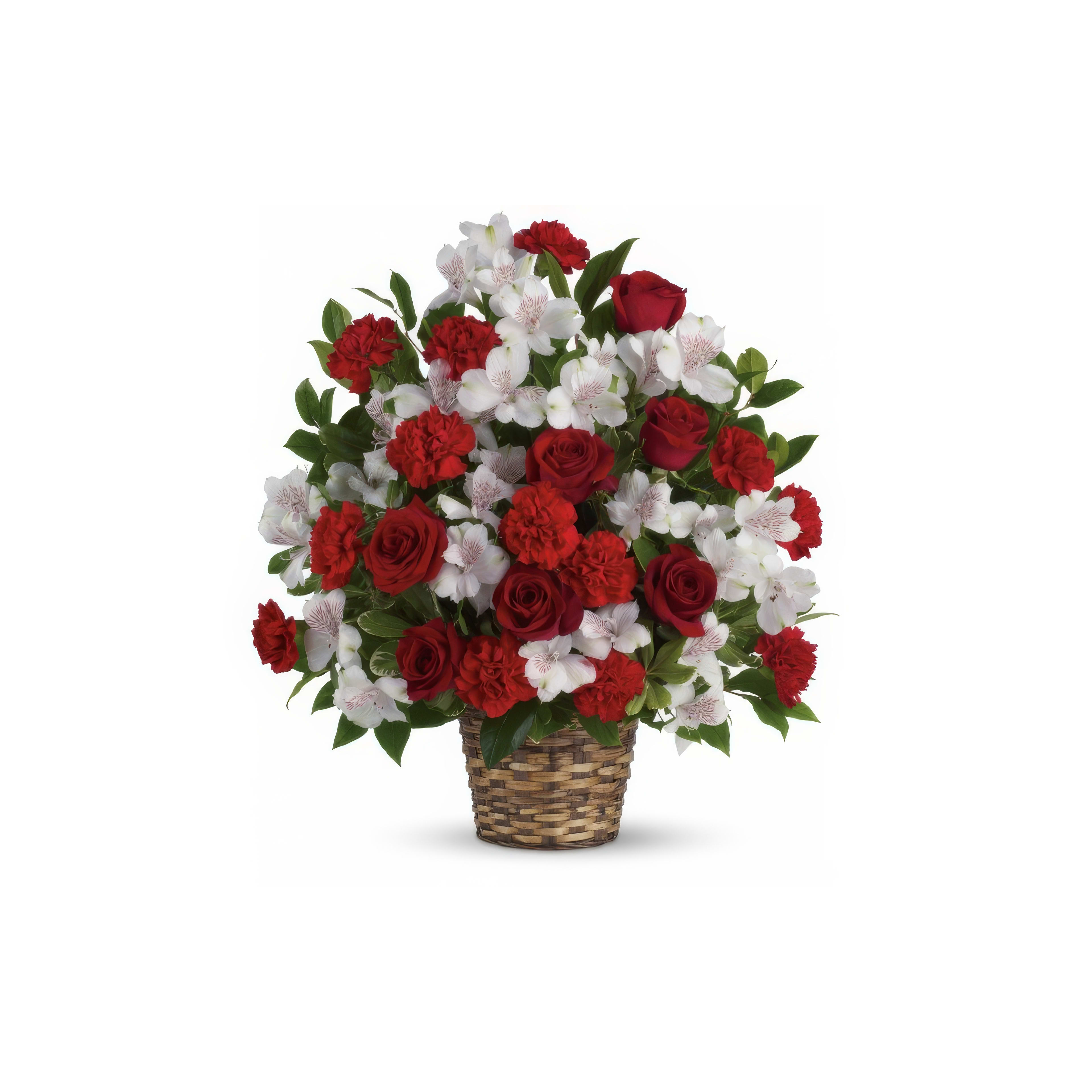Bright red roses and delicate white blooms create a stunning centerpiece in a woven basket.