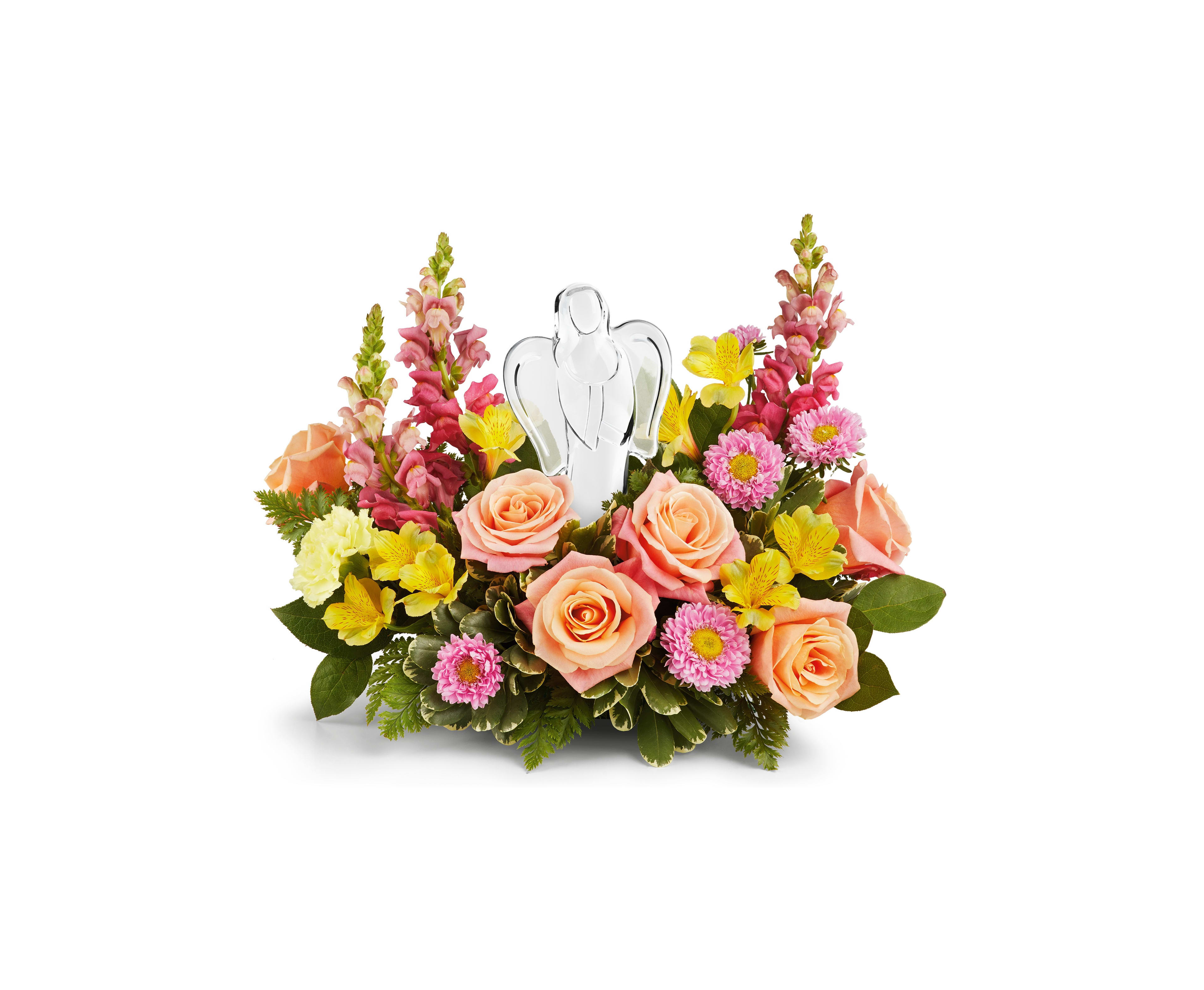 A bouquet of flowers with an angel figurine