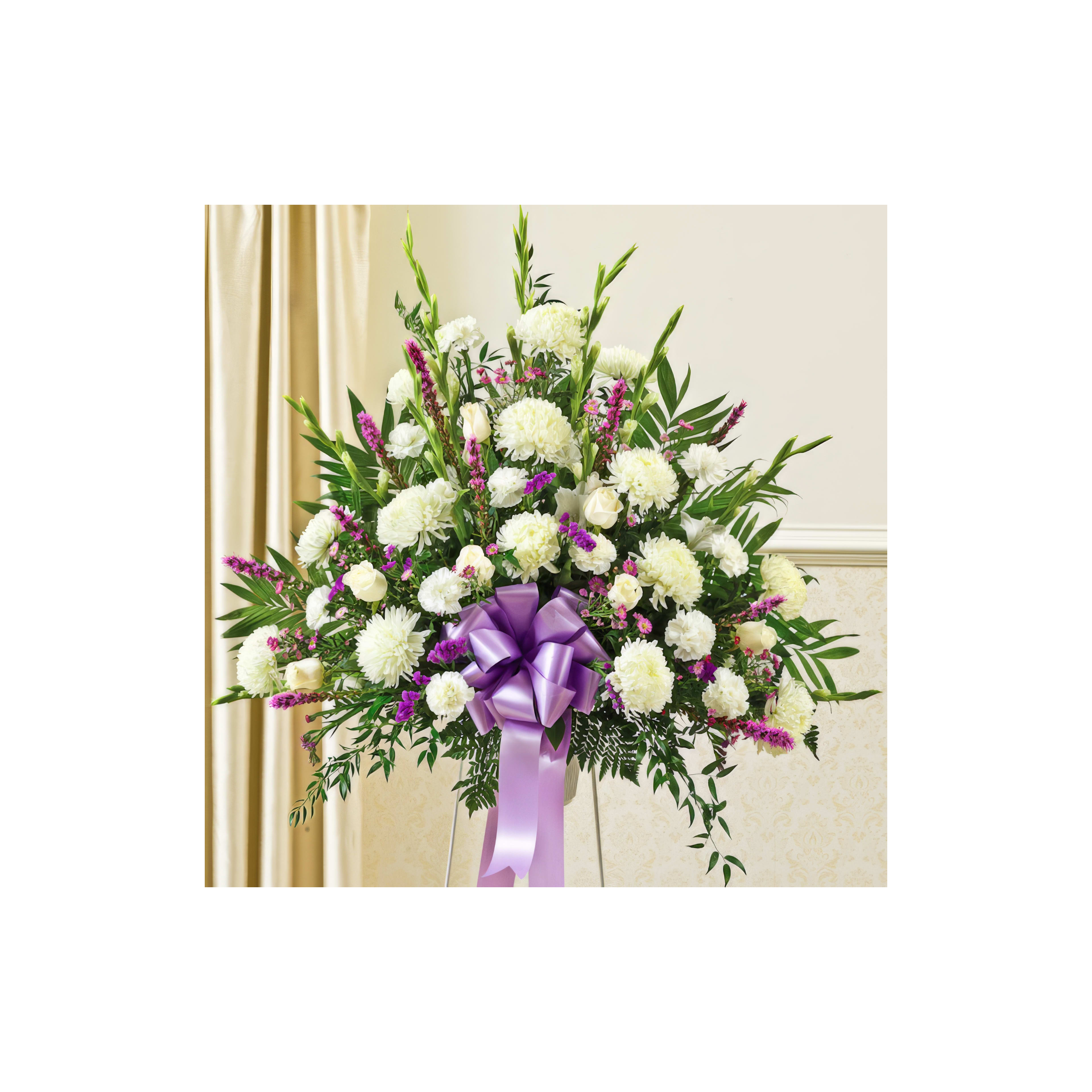 A lovely bouquet of white and purple flowers elegantly arranged for a special banquet.