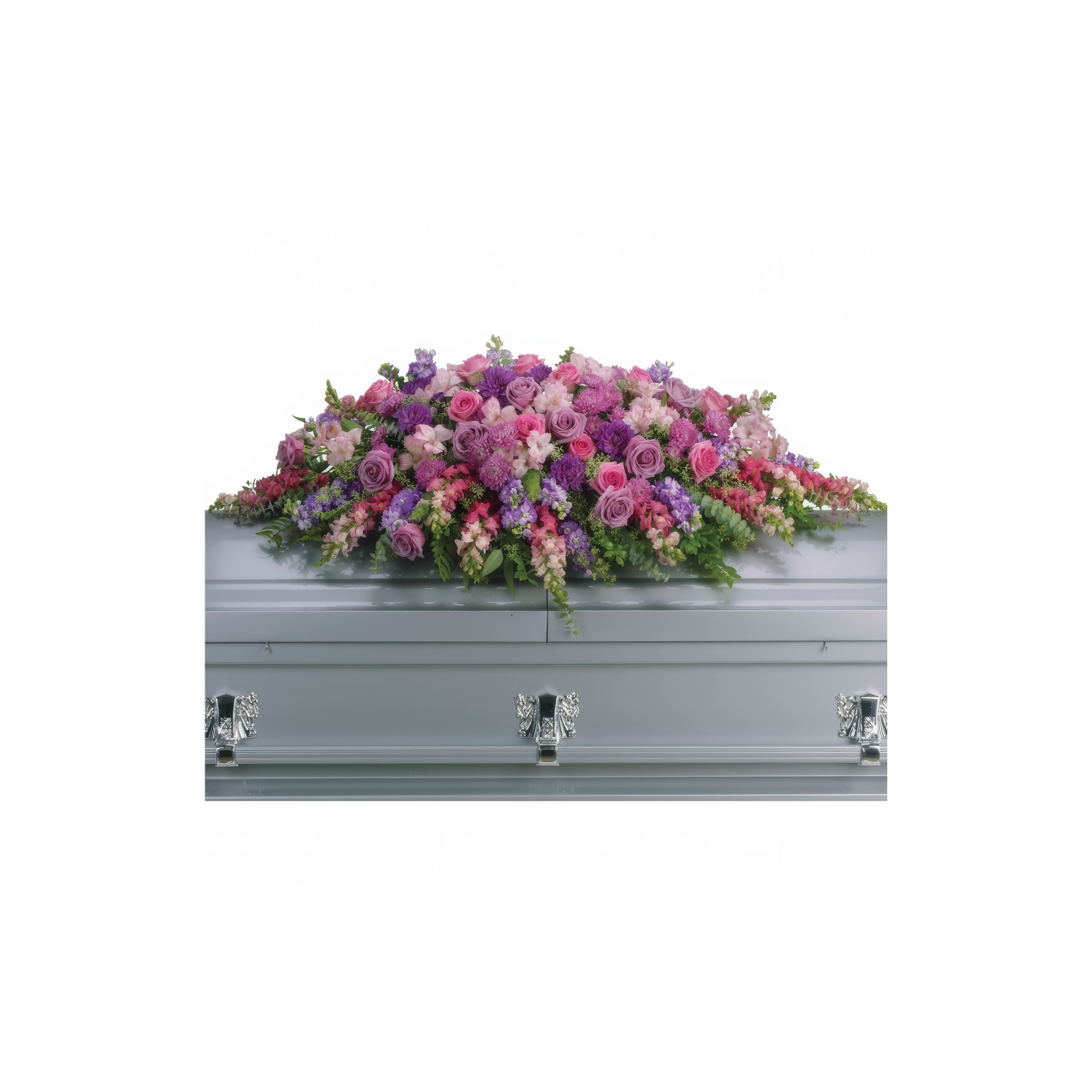Vibrant flowers in shades of pink and purple adorn a silver casket at a memorial service.