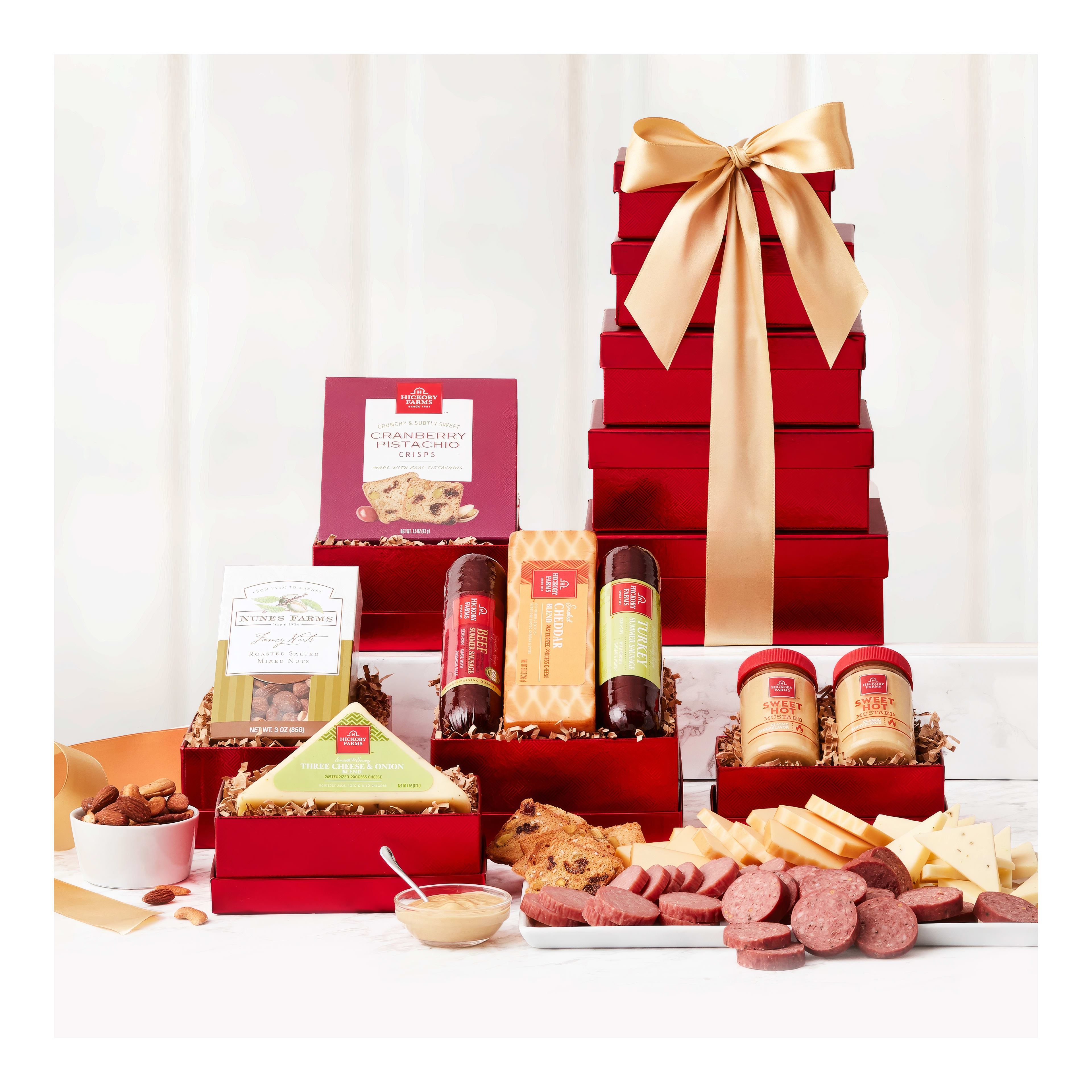 An elaborate display of red gift boxes filled with cookies, candies, and spreads ready for gifting.