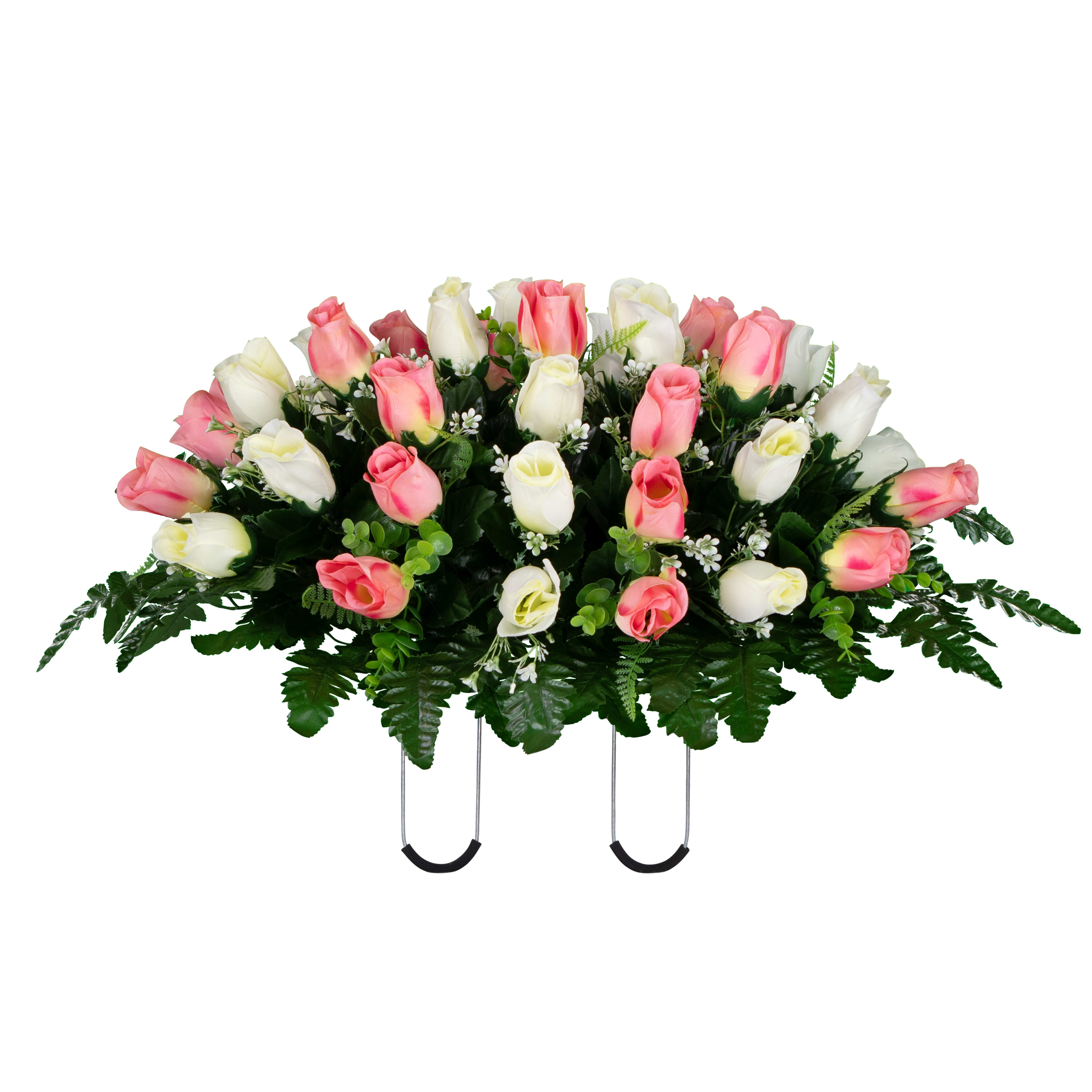 A striking arrangement of pink and white roses set atop green foliage for a special occasion.
