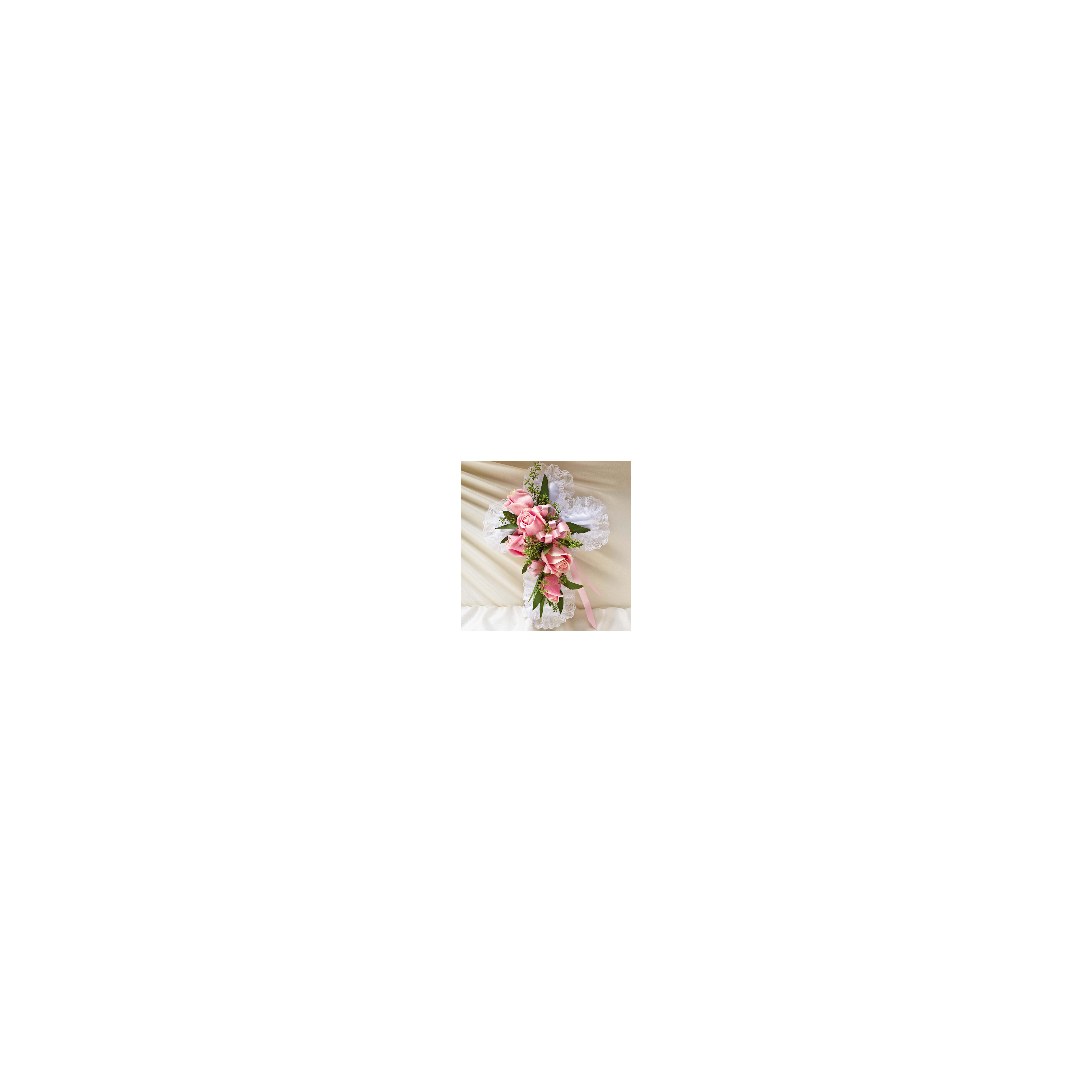 Beautiful floral cross with pink roses and greenery designed for a memorial event or ceremony.