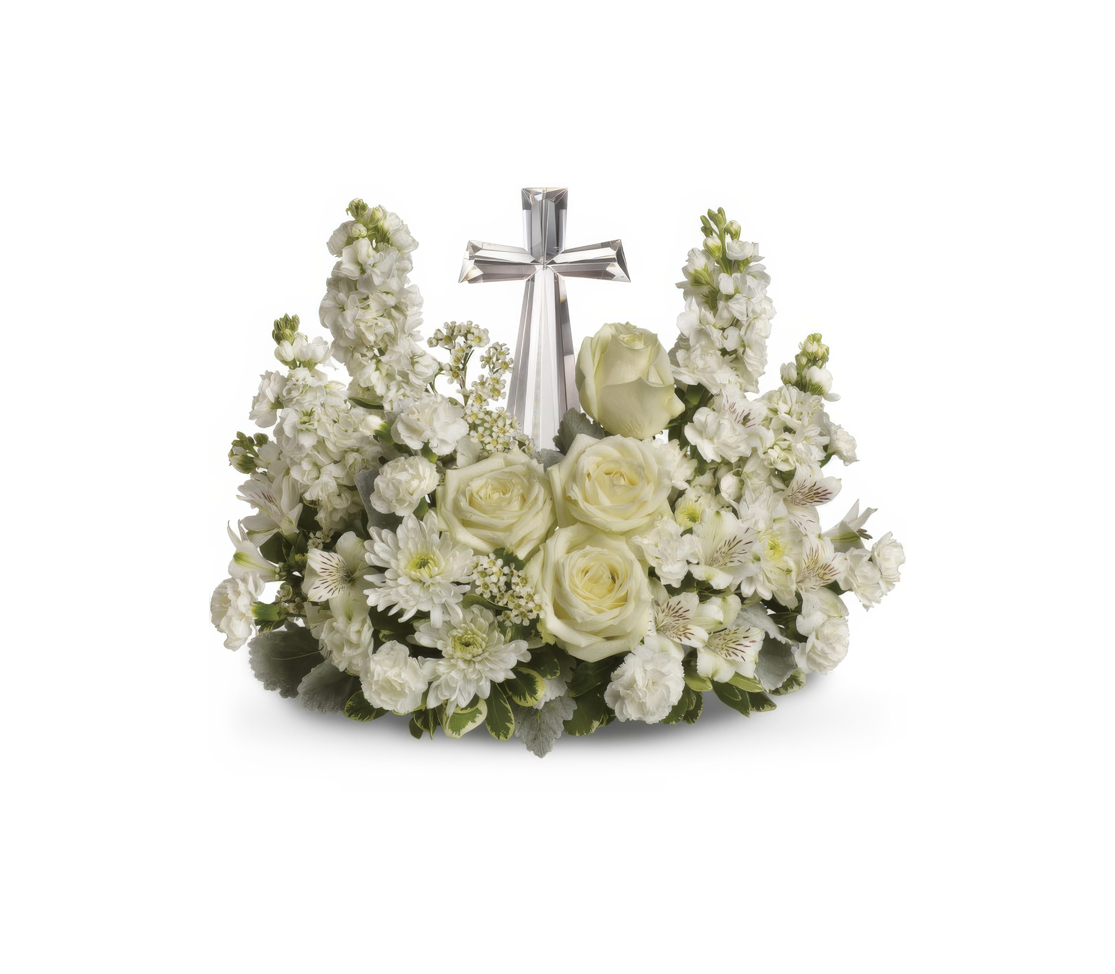 Beautiful flowers arranged with a cross, symbolizing remembrance and peace in a heartfelt tribute.