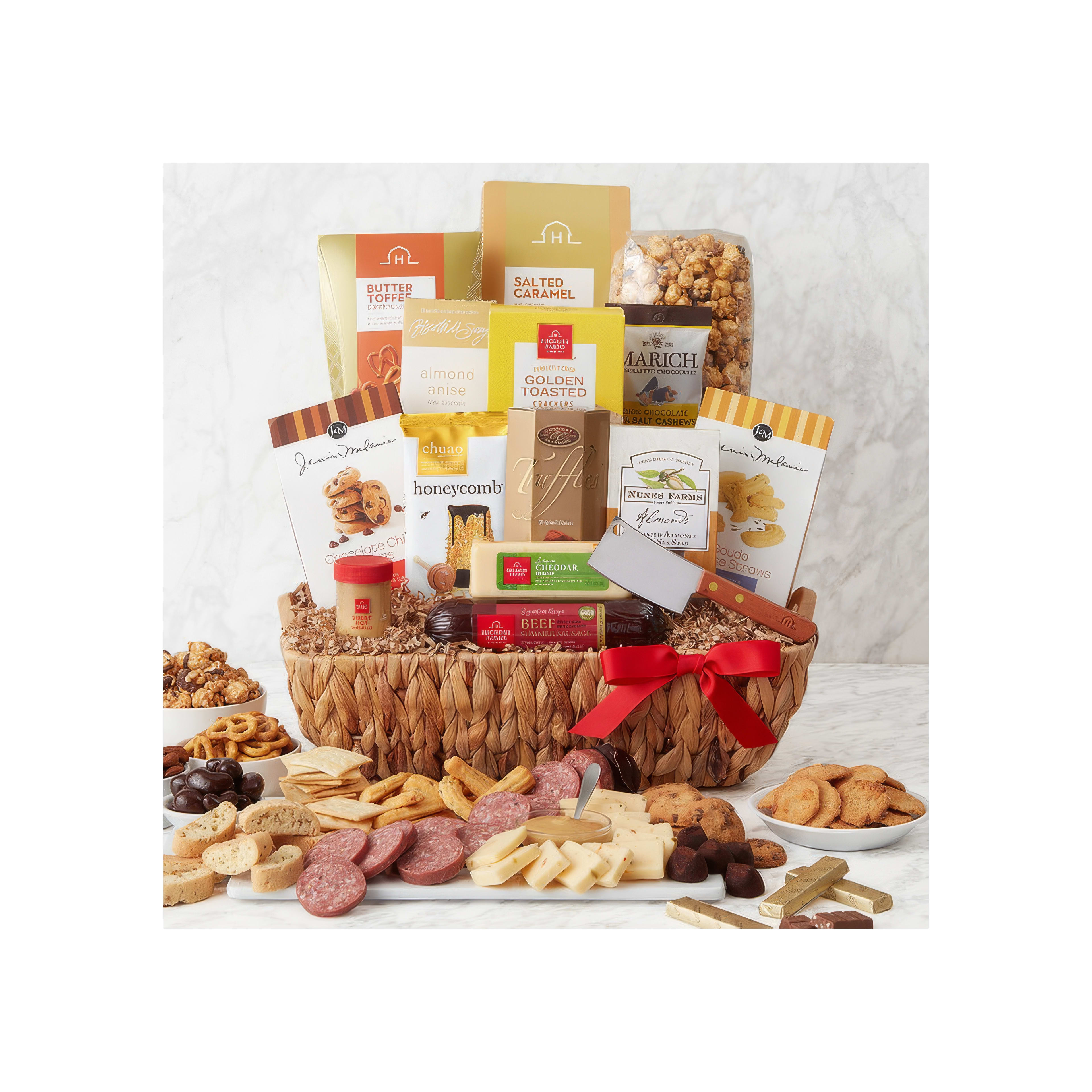 A large basket brimming with assorted snacks and treats is showcased on a smooth marble surface.