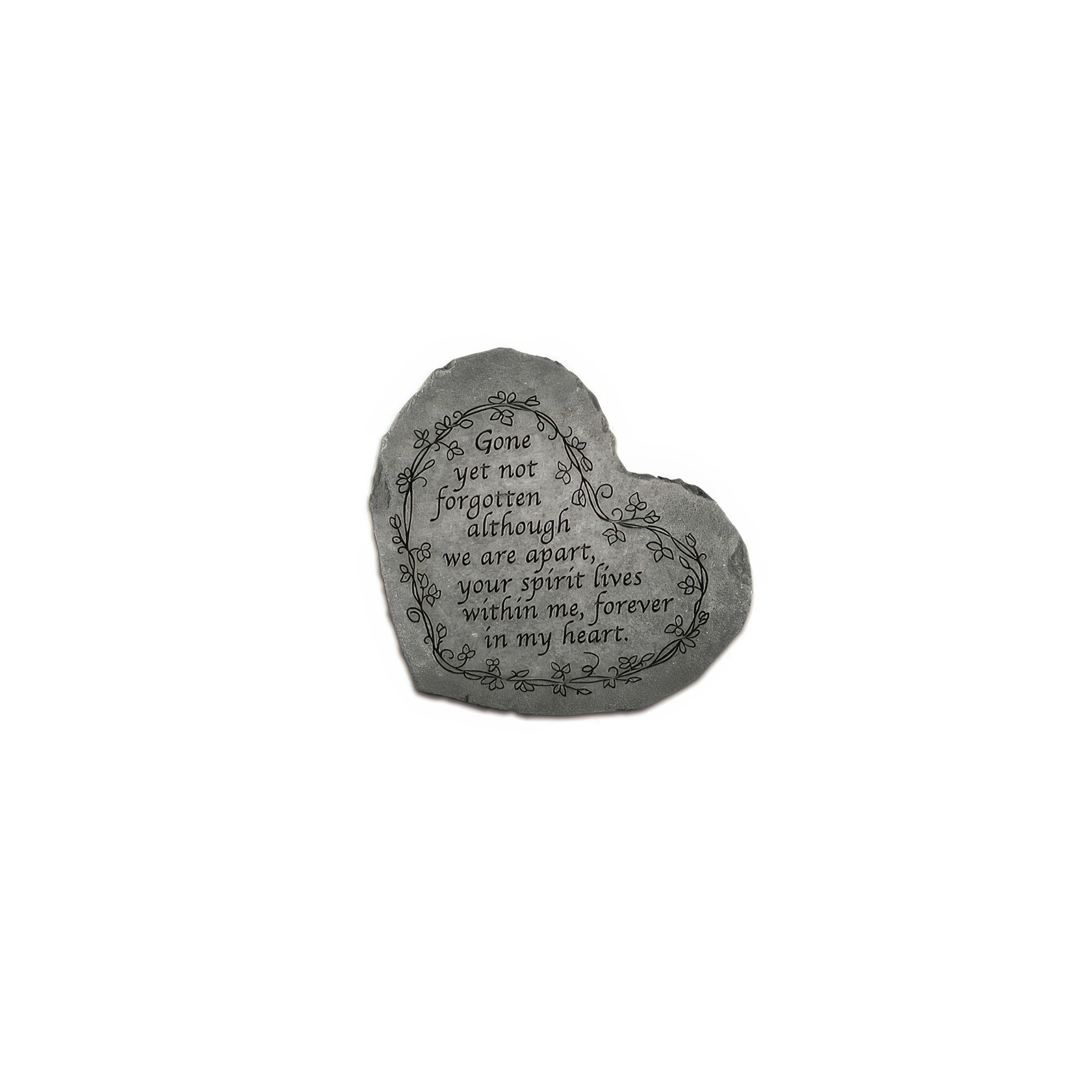 A heart-shaped stone features an engraved tribute about enduring love and remembrance.
