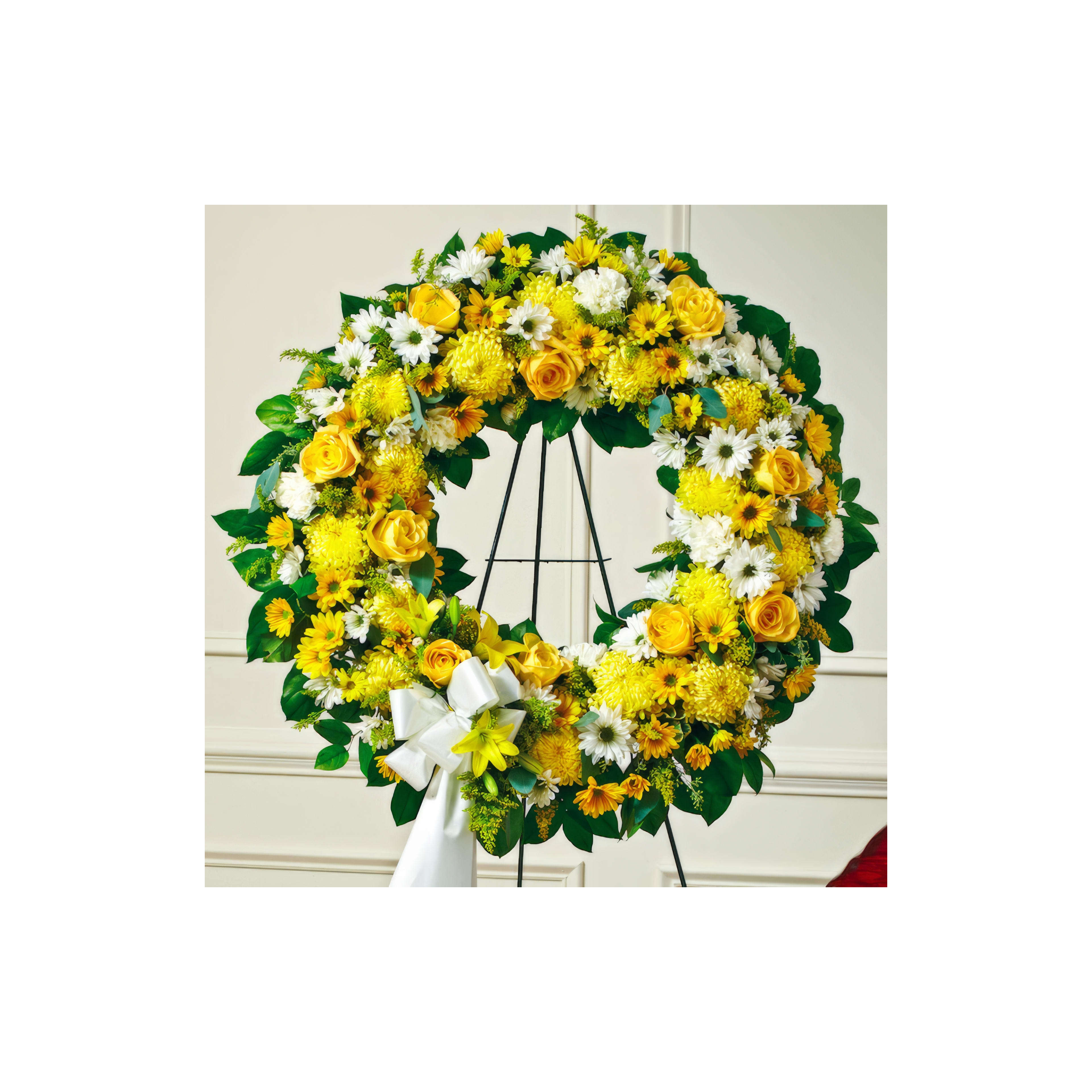 A vibrant wreath of yellow roses, sunflowers, and daisies perfect for any special occasion.