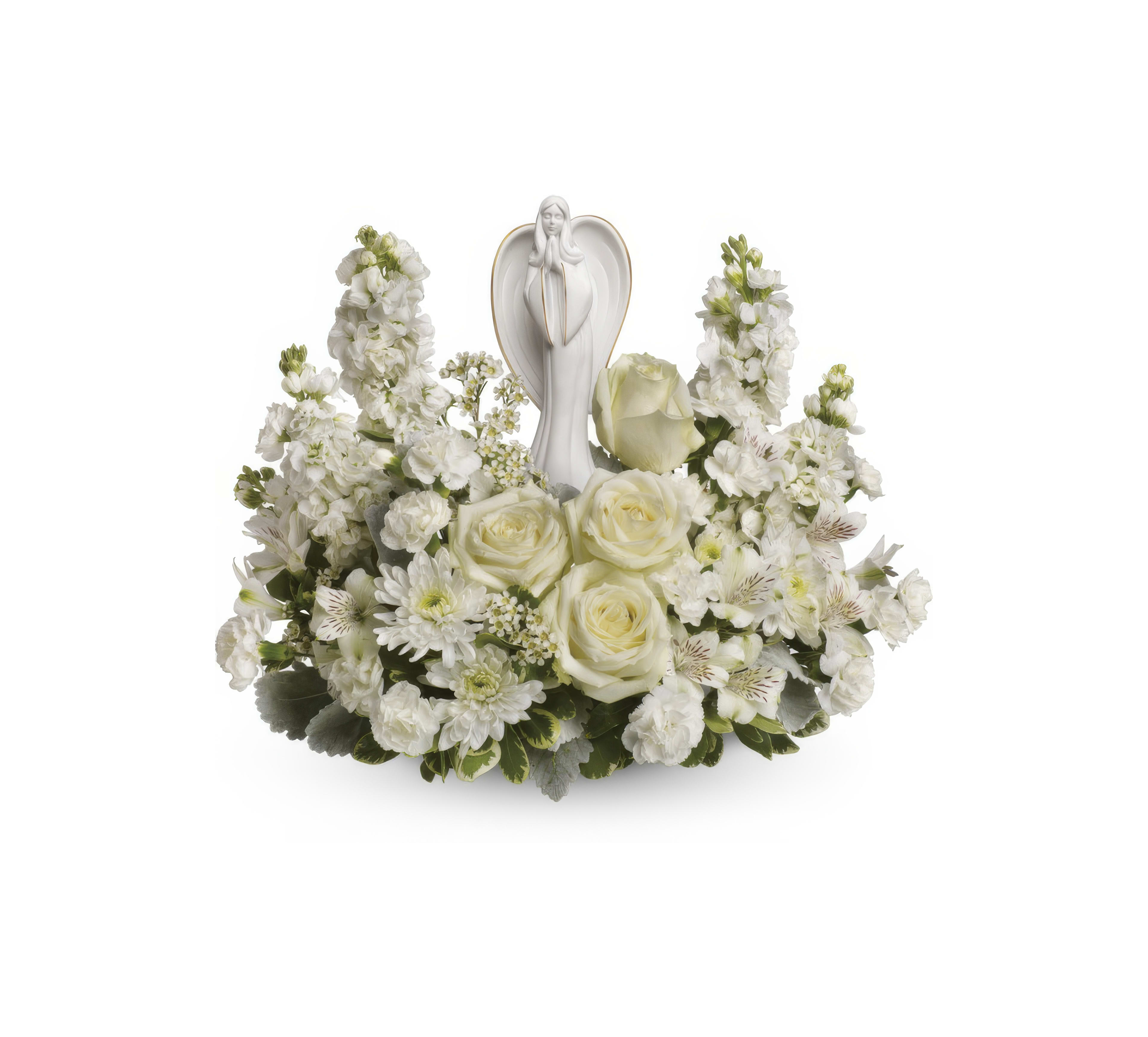 A stunning display of white flowers with an angel figurine at the center, perfect for celebrations.