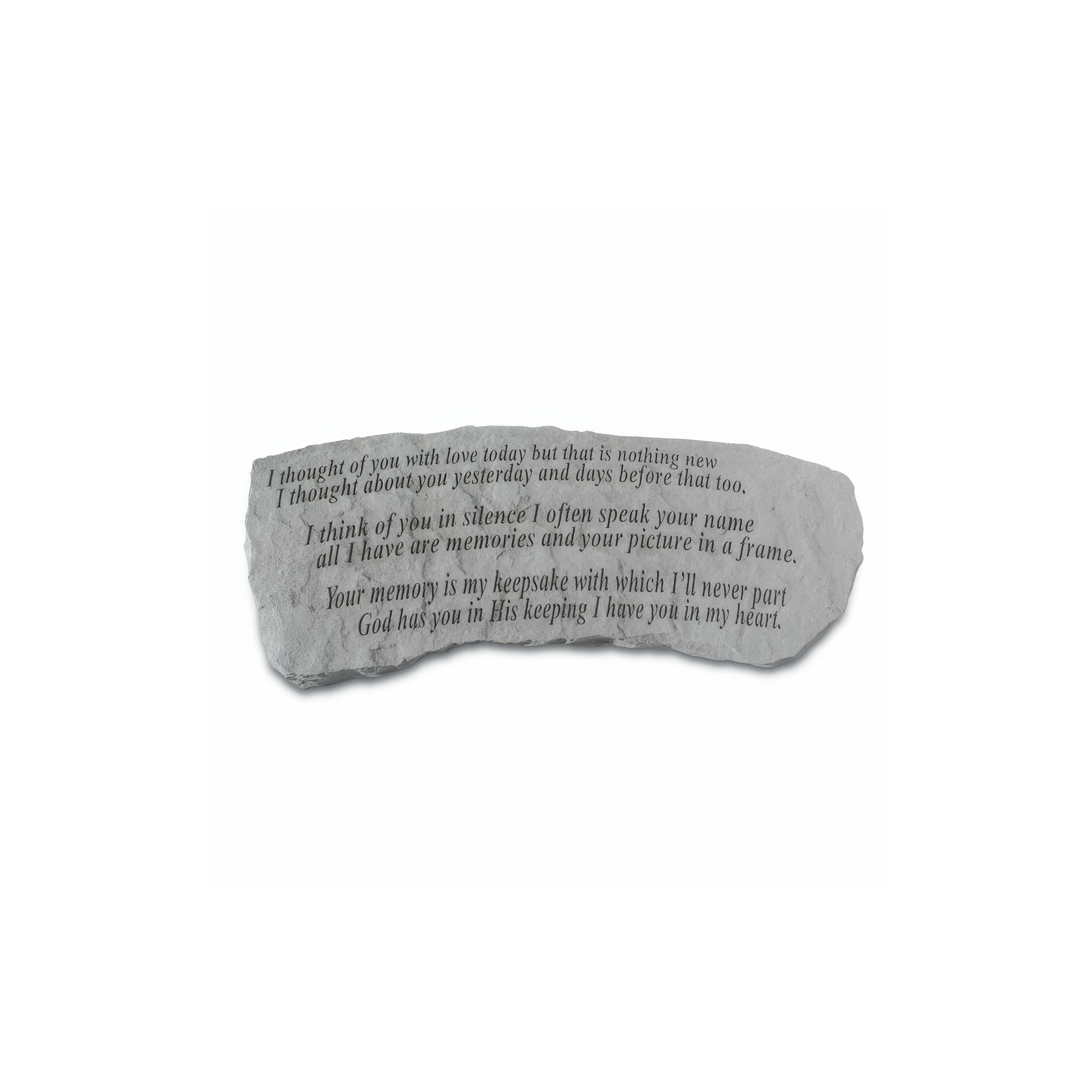 A stone tribute captures love and memories for a departed individual, showing lasting emotion.